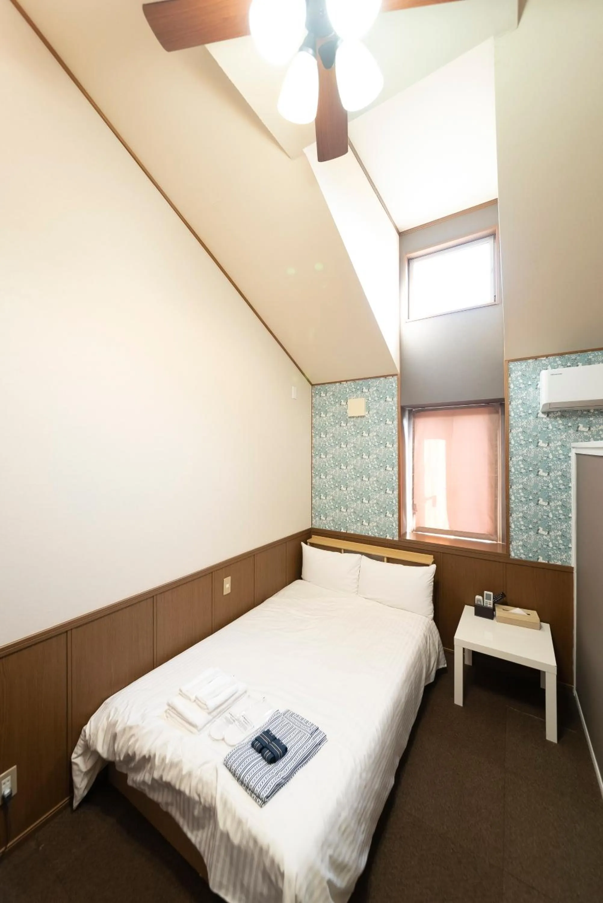 Photo of the whole room, Bed in ETAVIA Yufuin Kinrinko