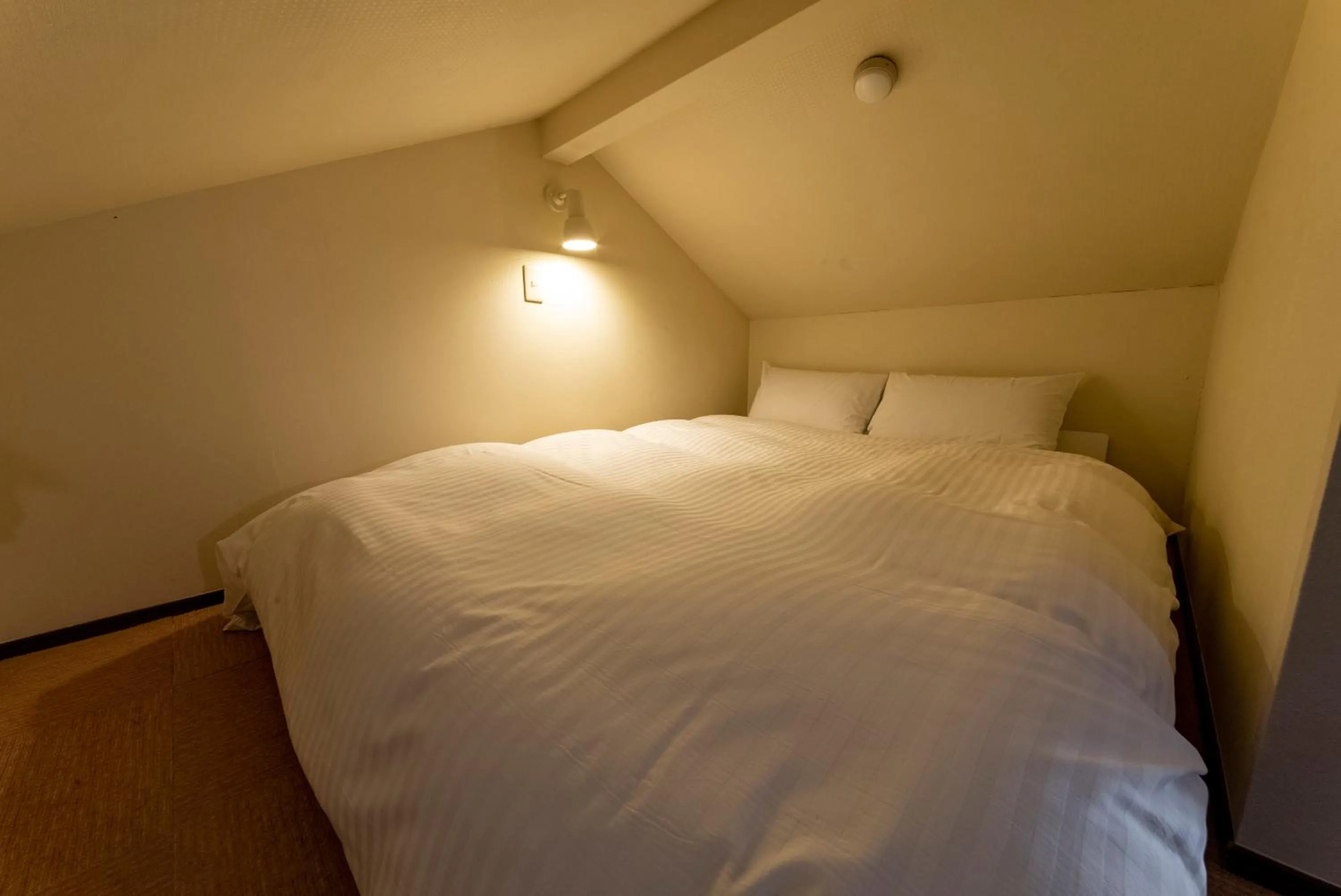 Photo of the whole room, Bed in ETAVIA Yufuin Kinrinko