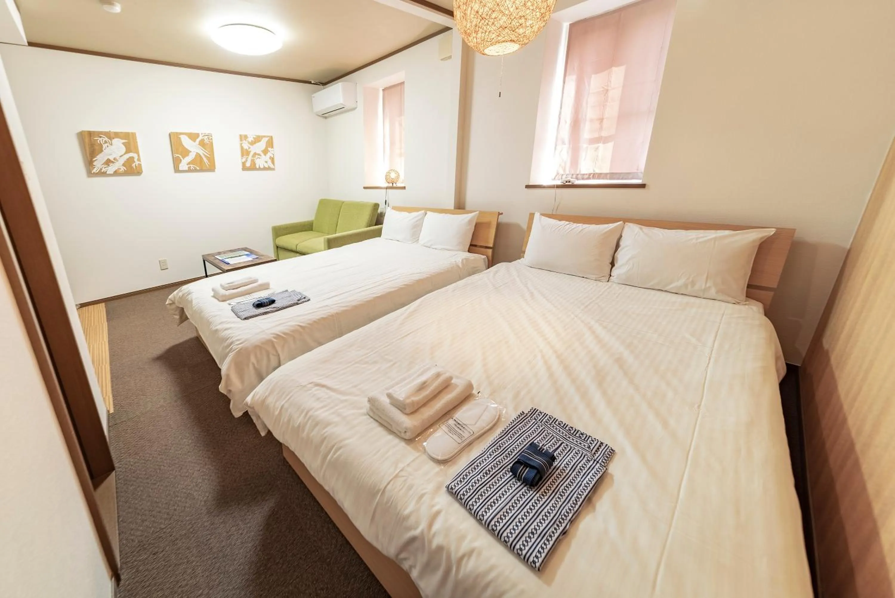 Photo of the whole room, Bed in ETAVIA Yufuin Kinrinko