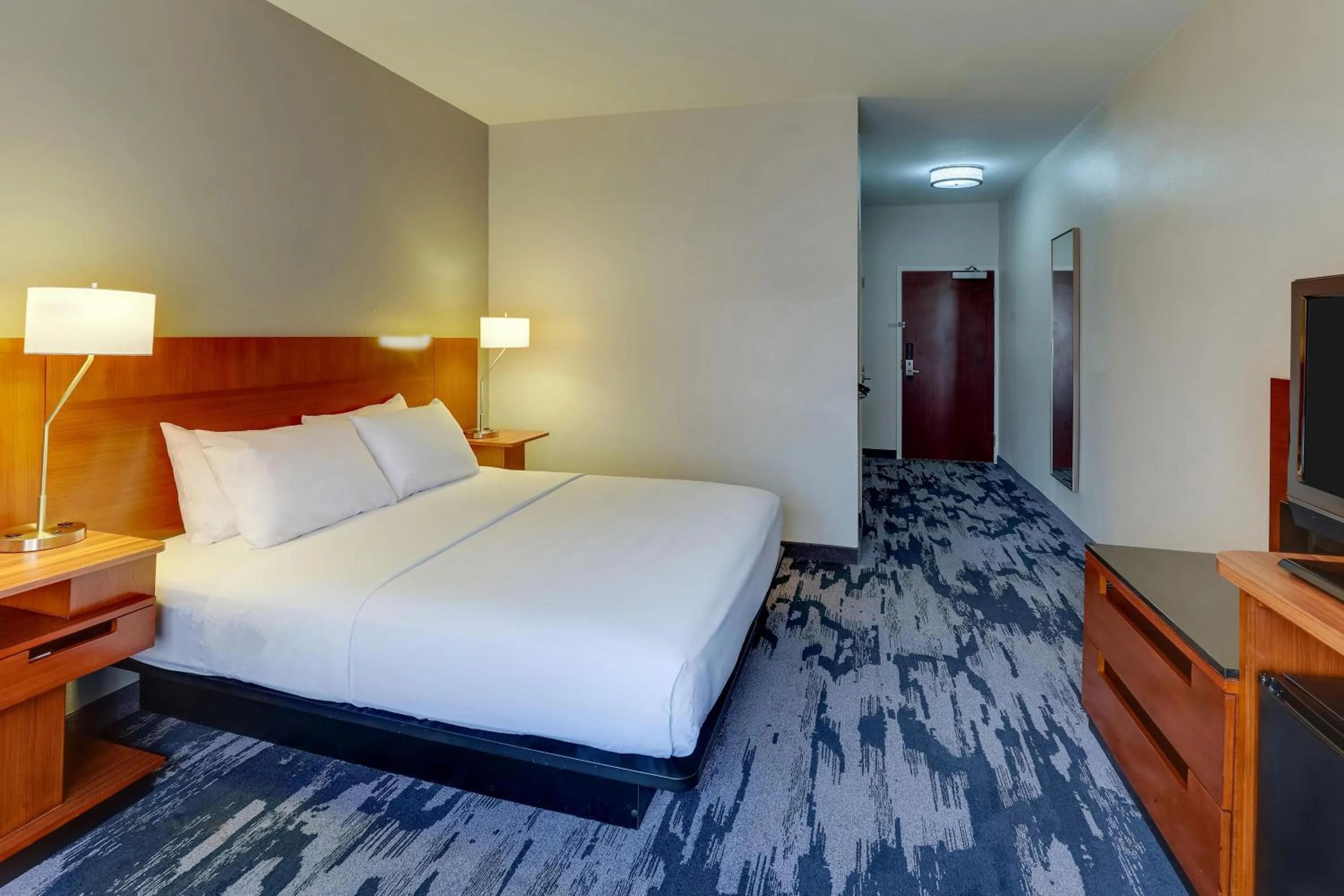 Bedroom in Las Colinas Inn Irving, SureStay Collection by Best Western