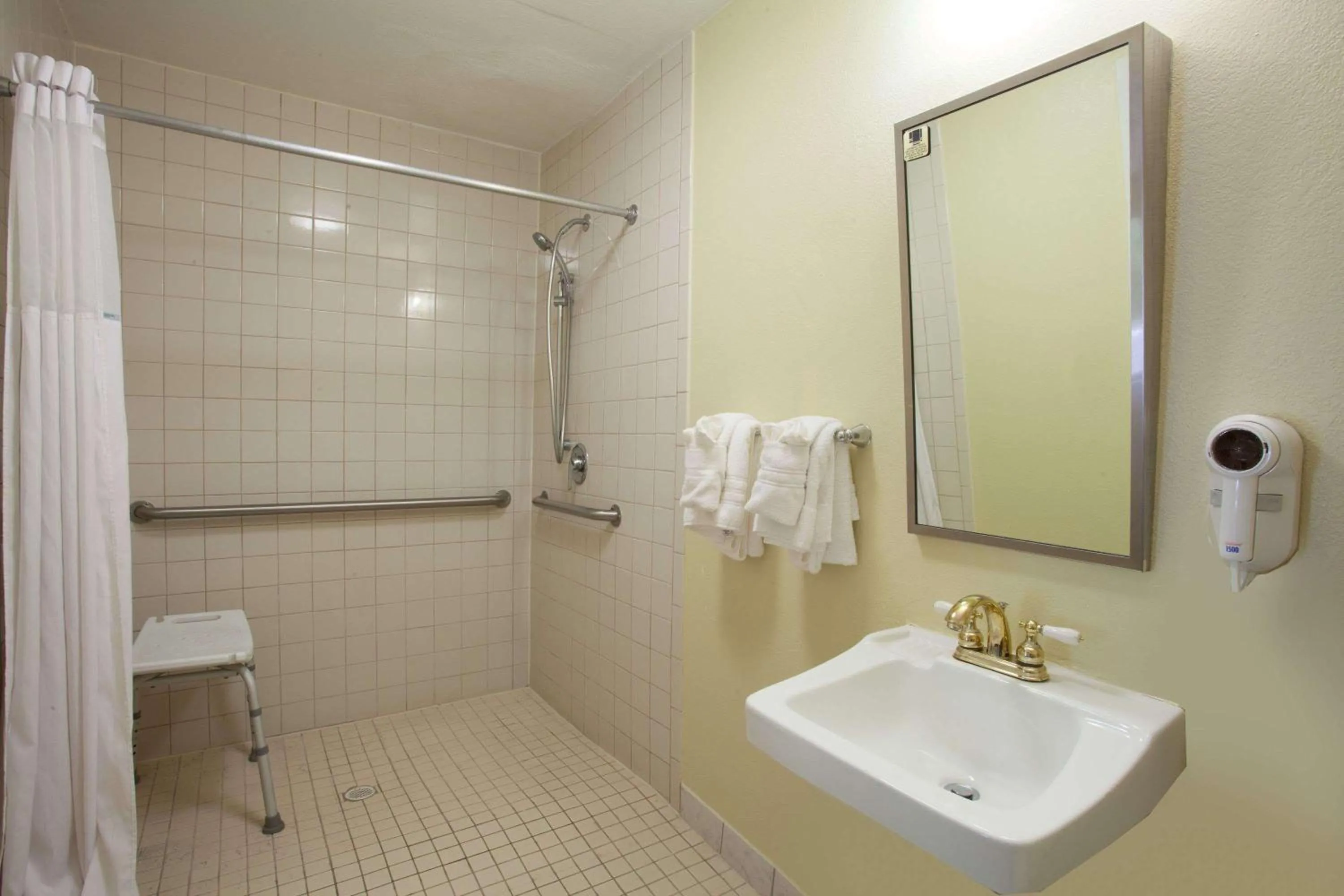 Bathroom in Days Inn by Wyndham Daytona Beach Speedway