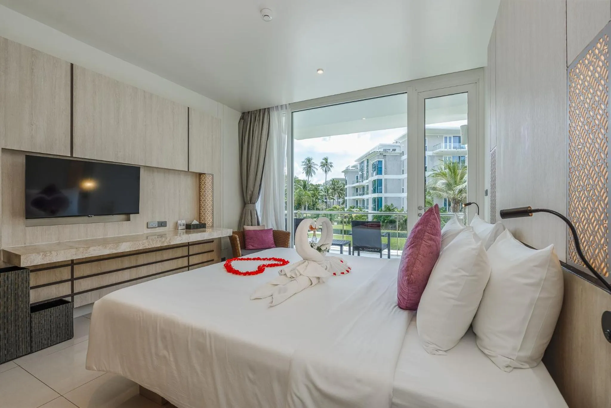 Bed in Splash Beach Resort Phuket Family-Friendly Water Park Resort Near Phuket Airport