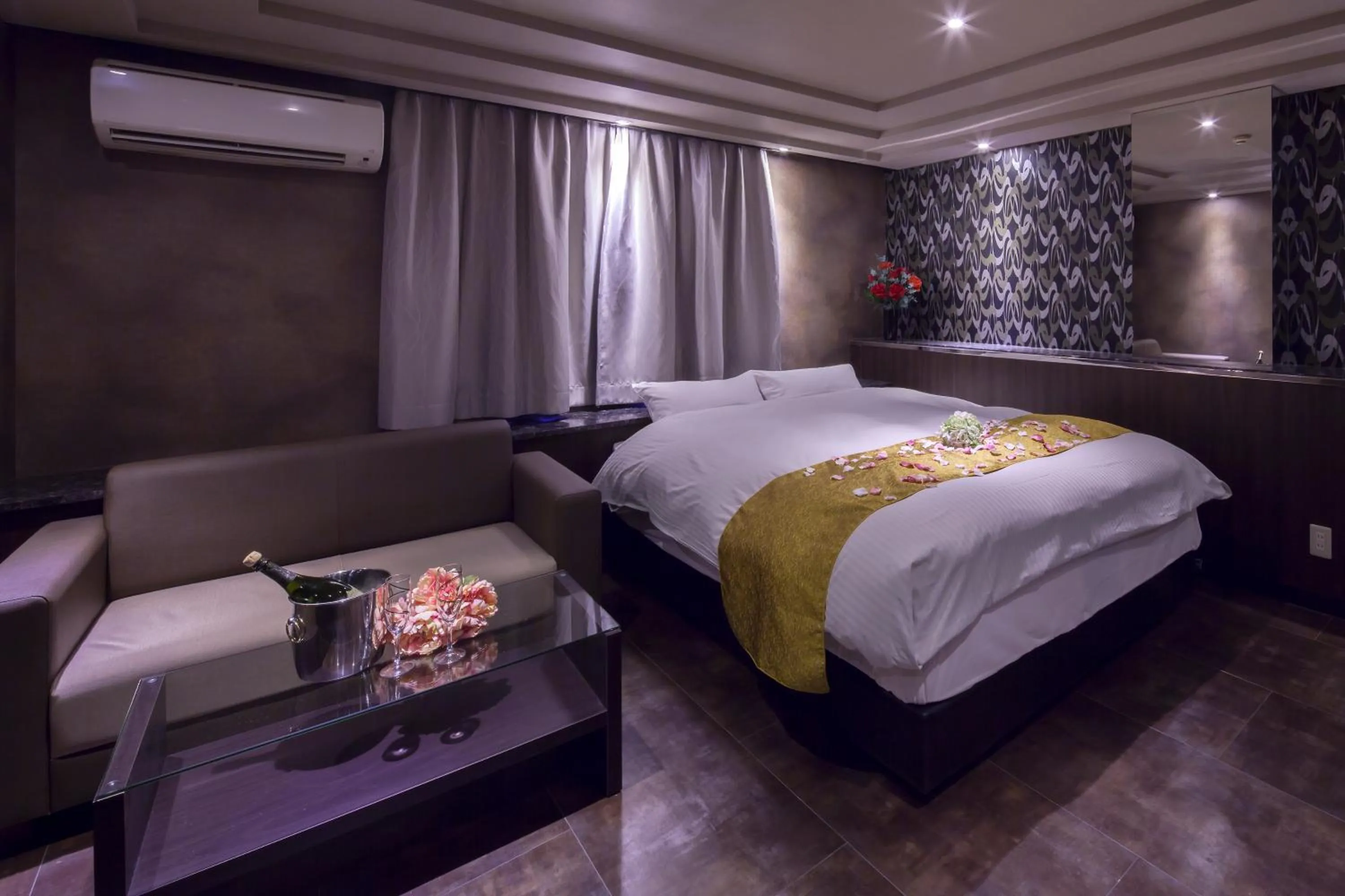 Bed in ホテルオリジン Hotel Origin 男塾ホテルグループ