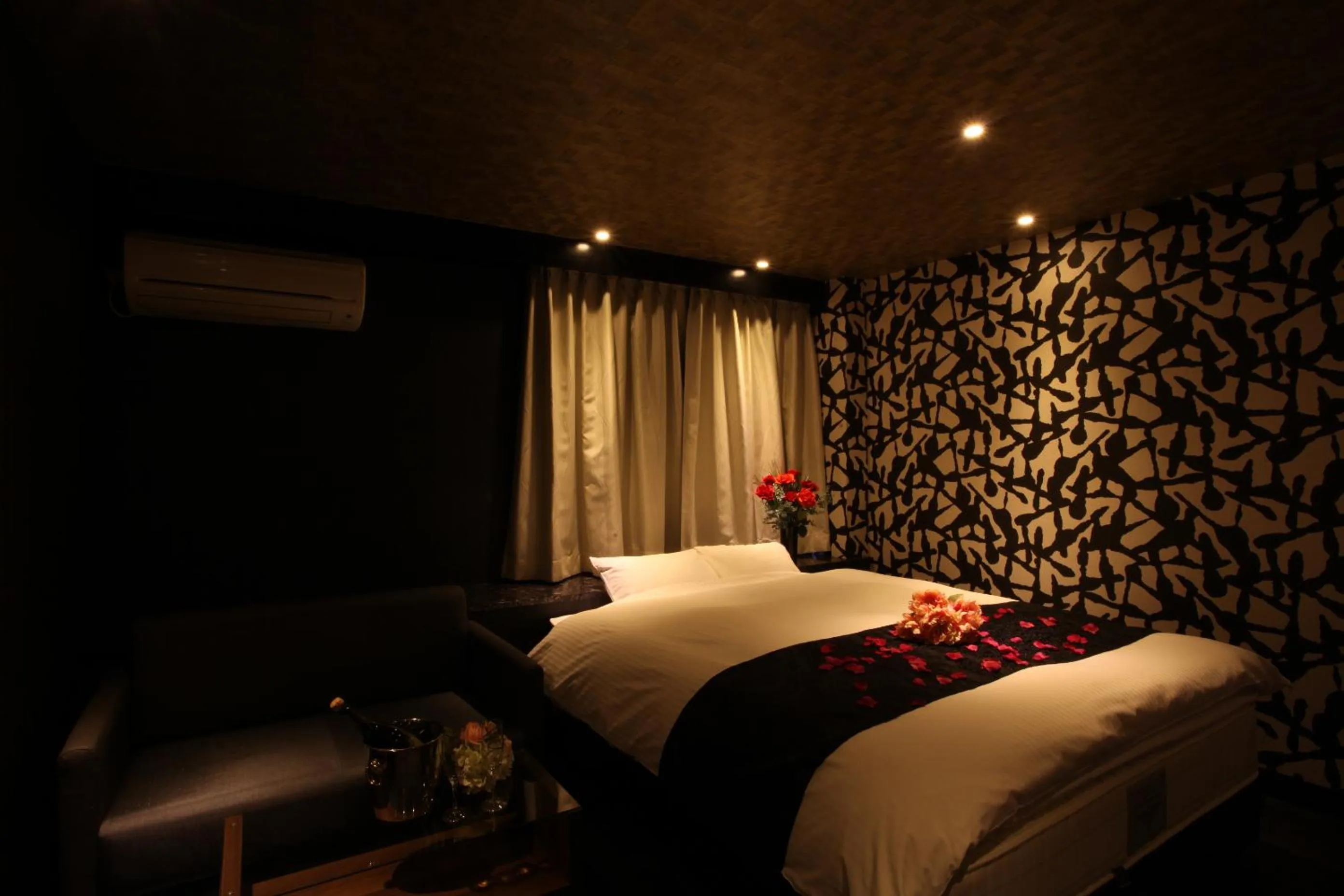 Bed in ホテルオリジン Hotel Origin 男塾ホテルグループ