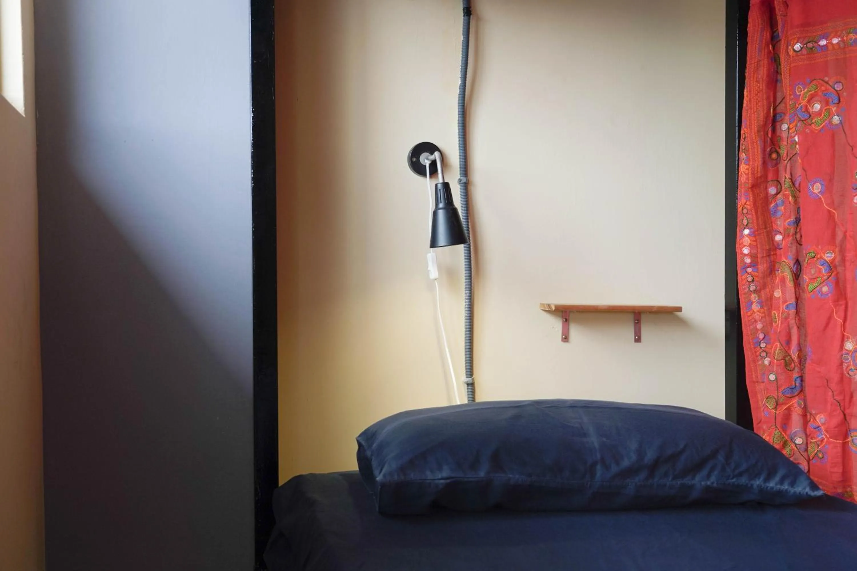 Bed in Dulan The Travel Bug Bistro Inn