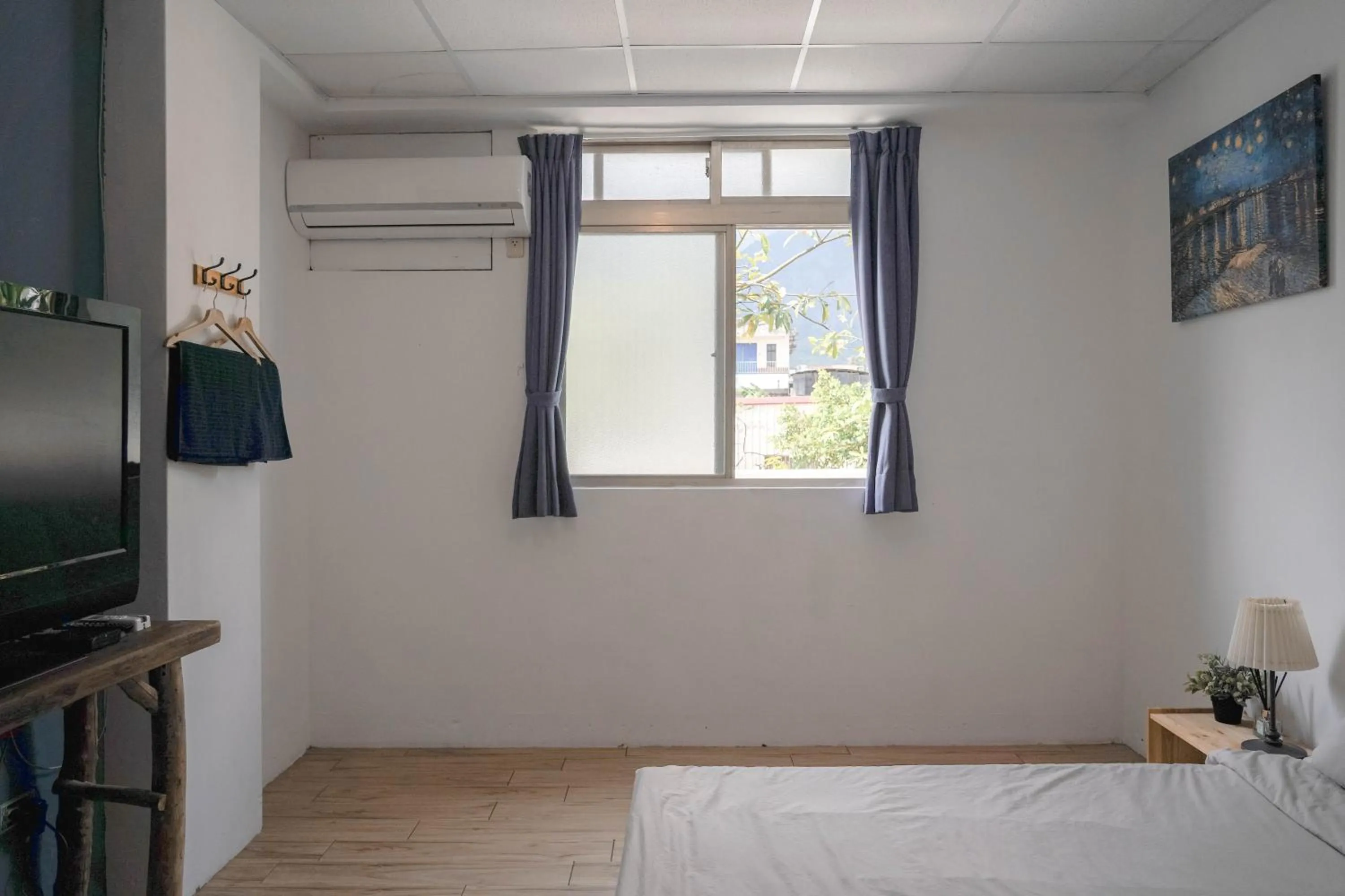 Bed in Dulan The Travel Bug Bistro Inn