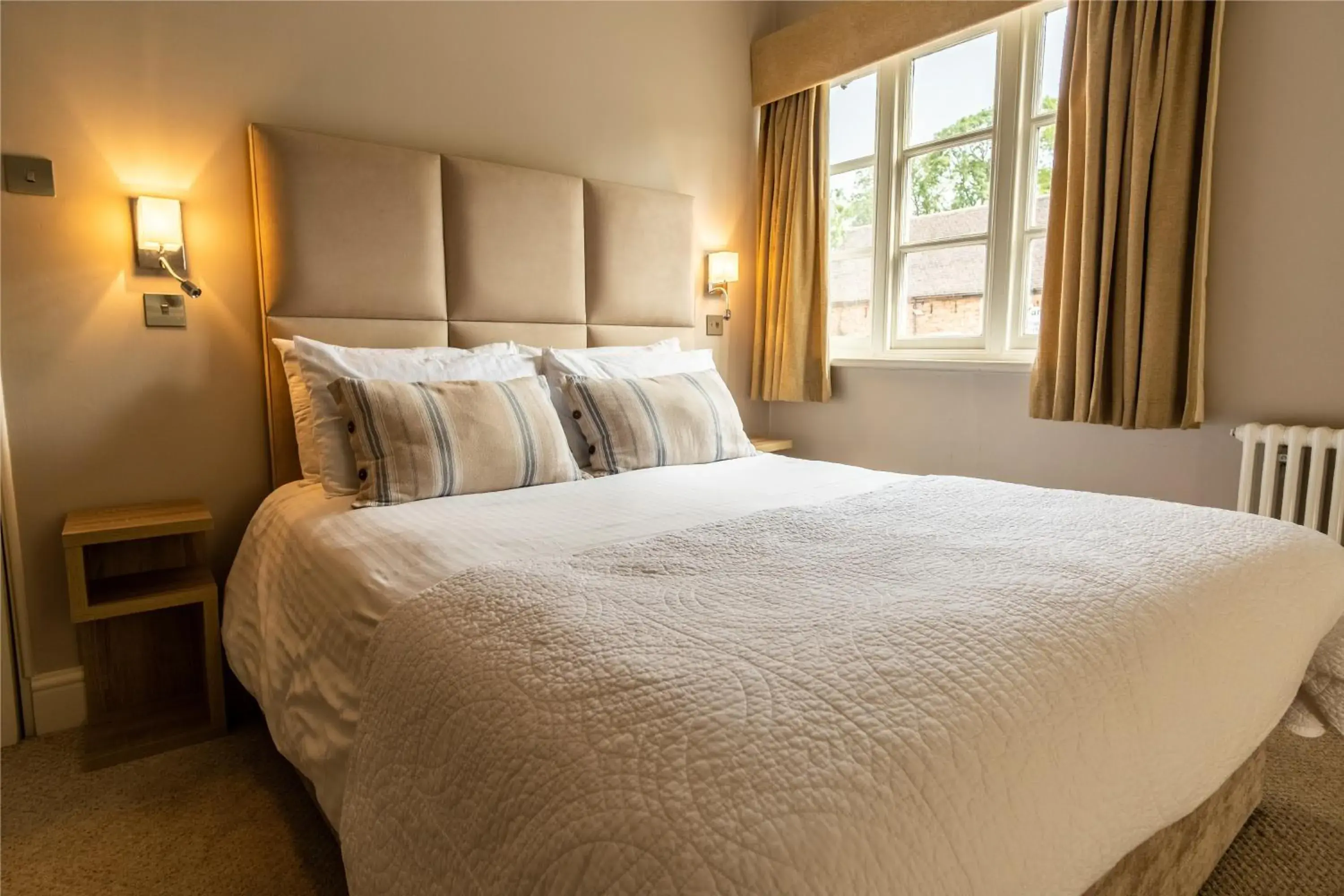Bed in Donington Park Farmhouse Hotel