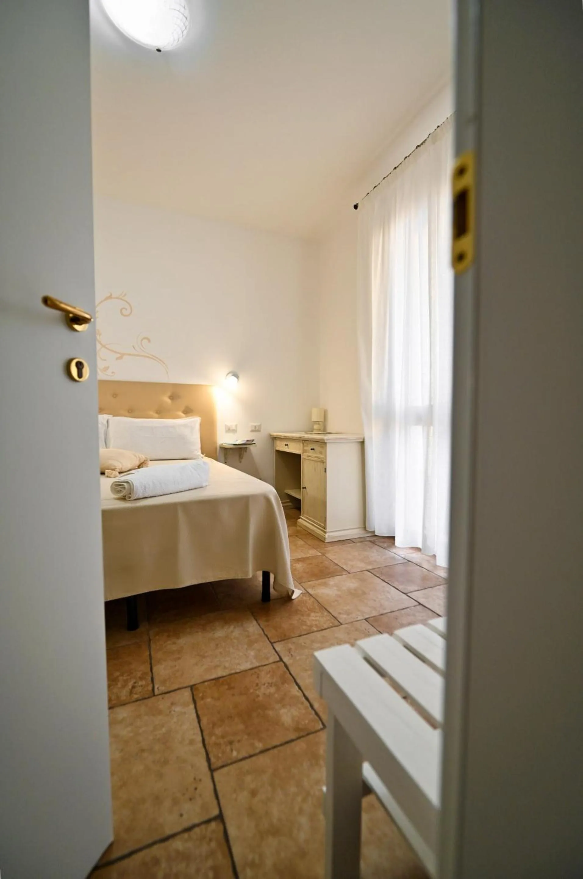 Bedroom in Olimpo B&B