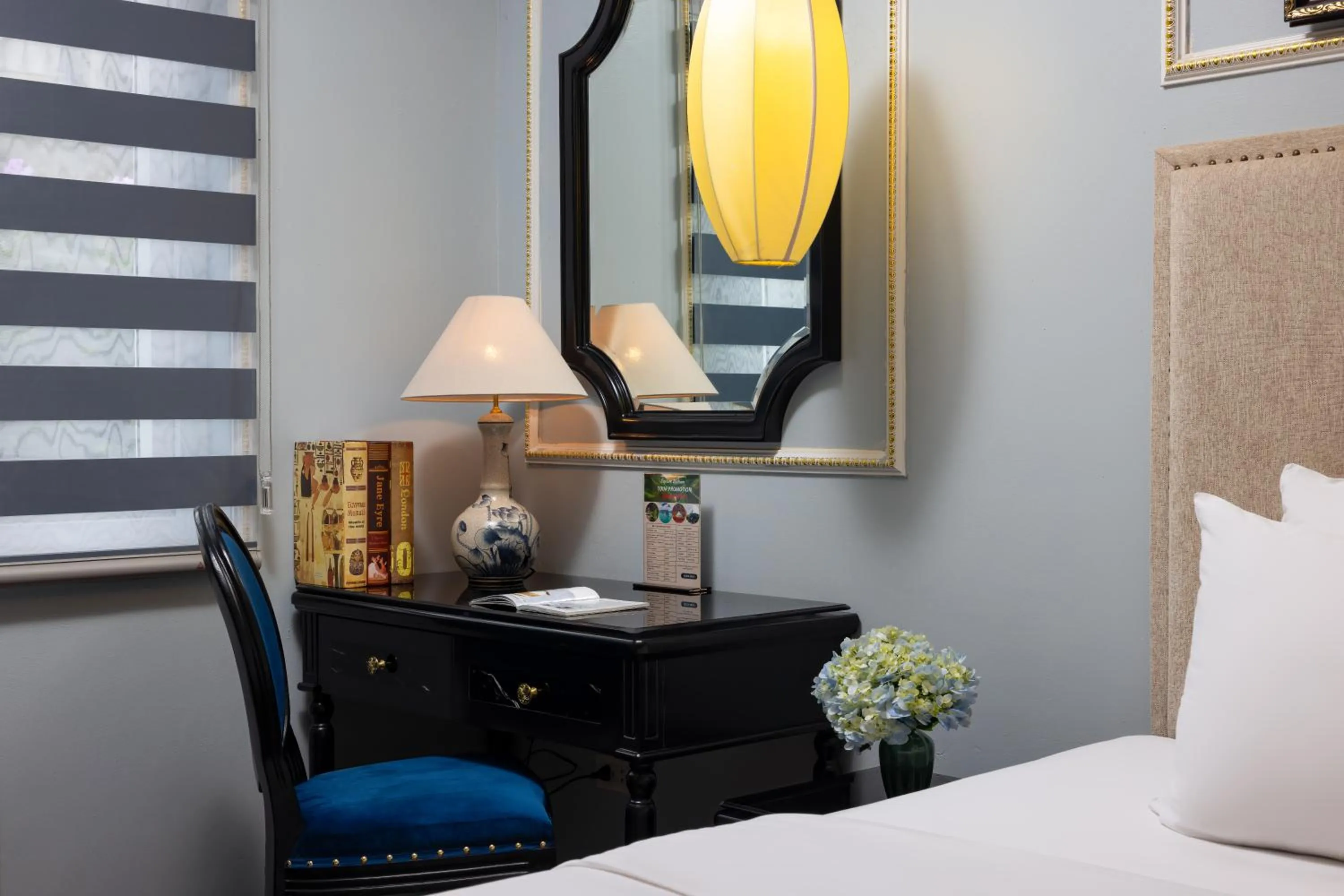 Seating area, Bed in Golden Legend Boutique Hotel