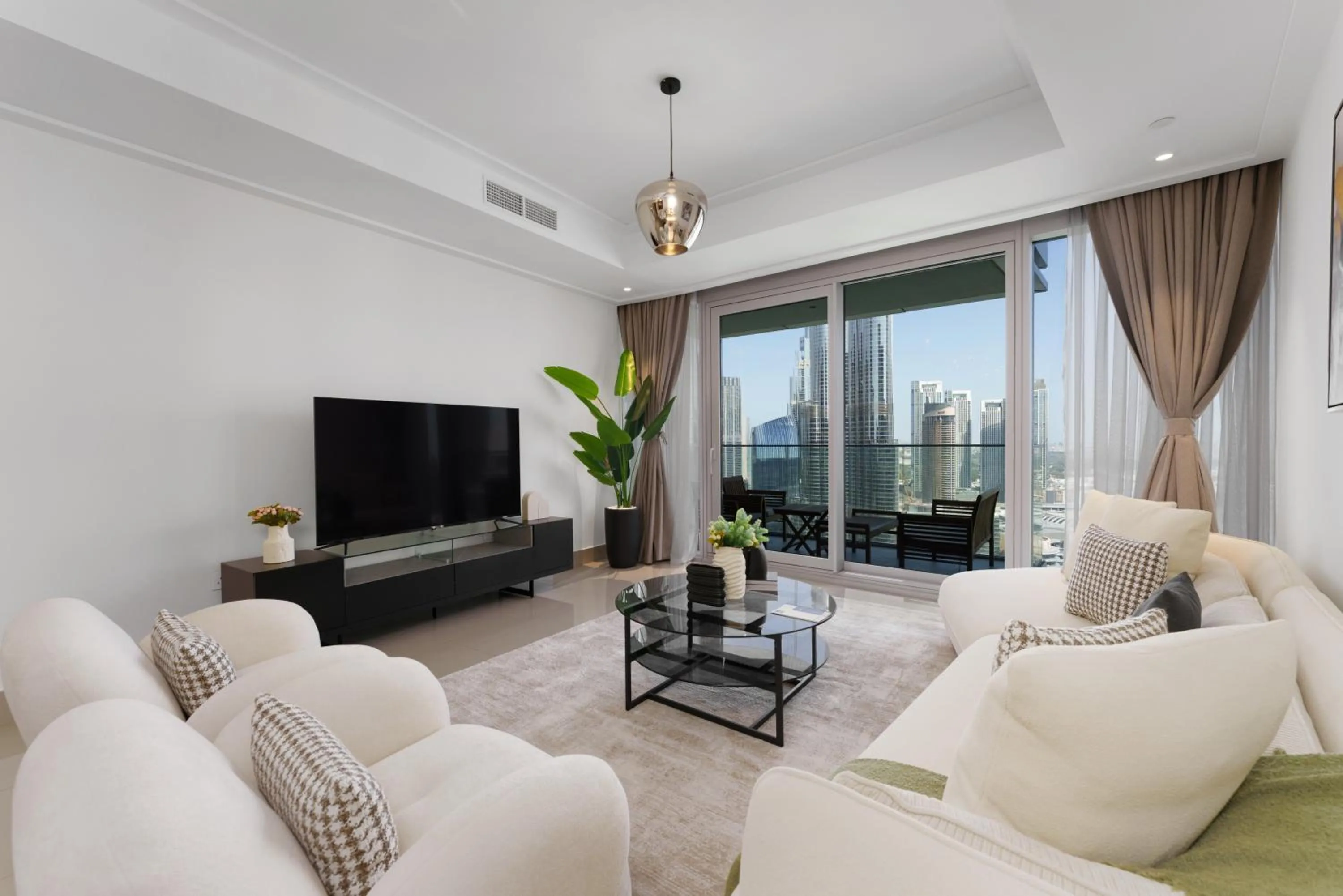 Living room in Maison Privee - Ultimate Living with Front-Row Views of Burj Khalifa & Dubai Fountains