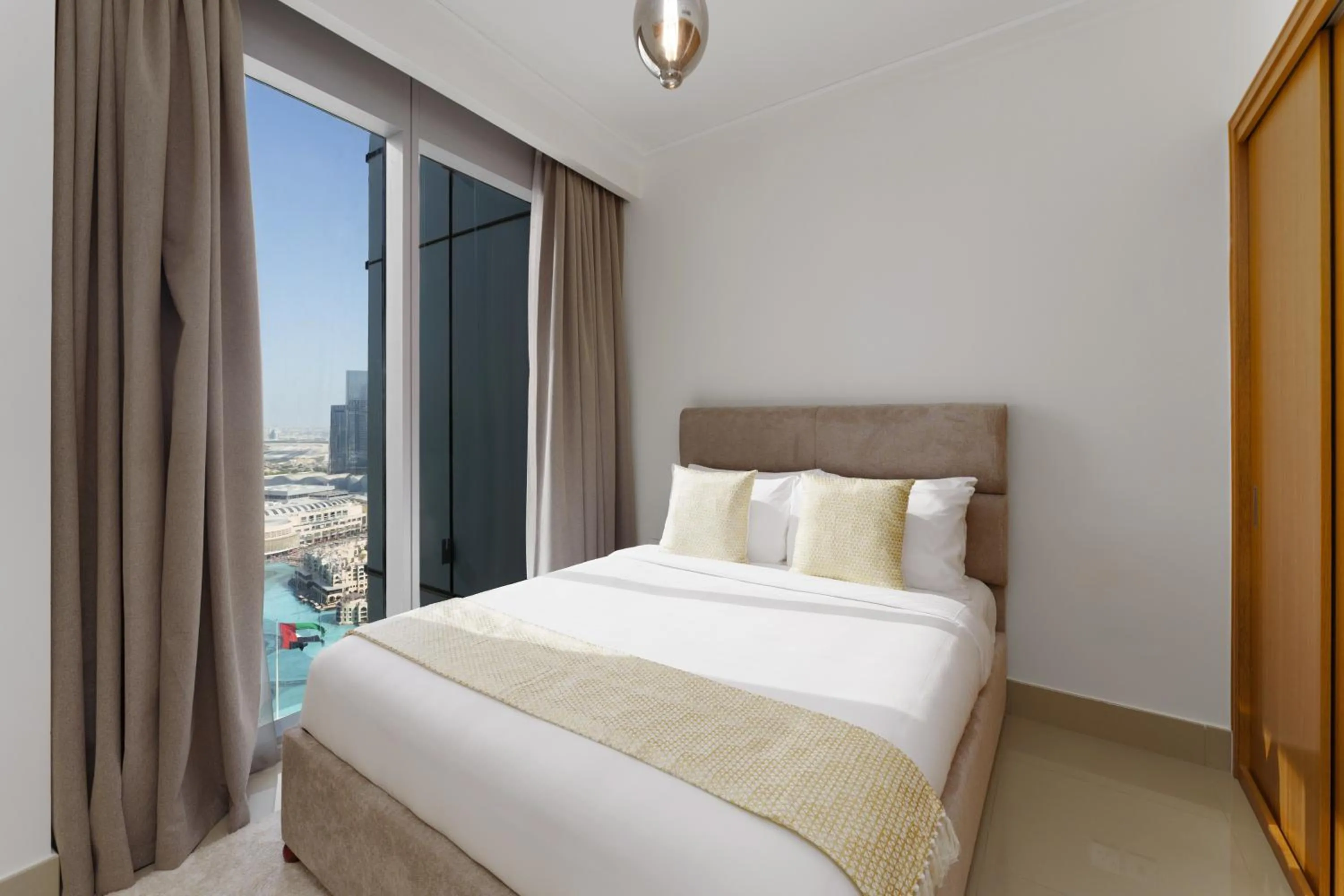 Bed in Maison Privee - Ultimate Living with Front-Row Views of Burj Khalifa & Dubai Fountains