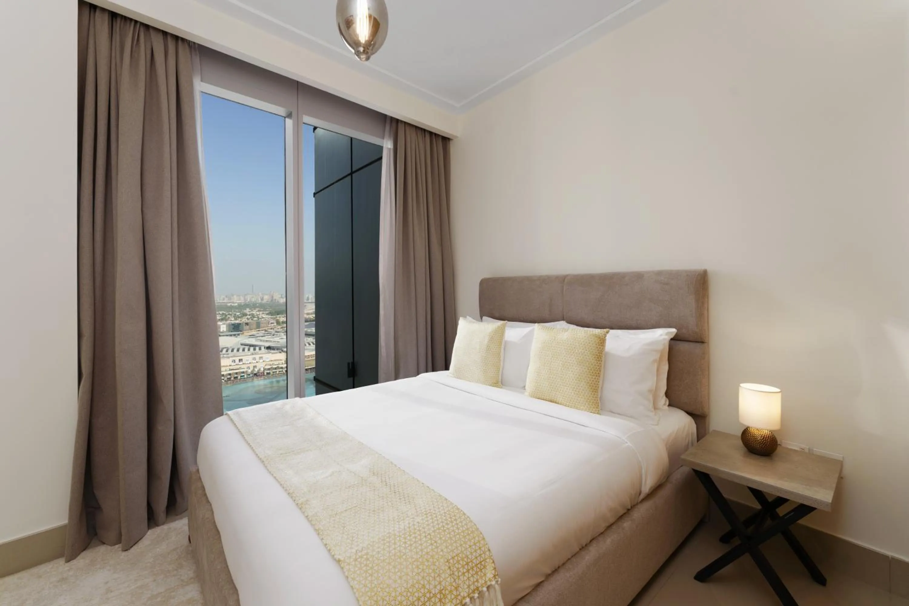 Bed in Maison Privee - Ultimate Living with Front-Row Views of Burj Khalifa & Dubai Fountains