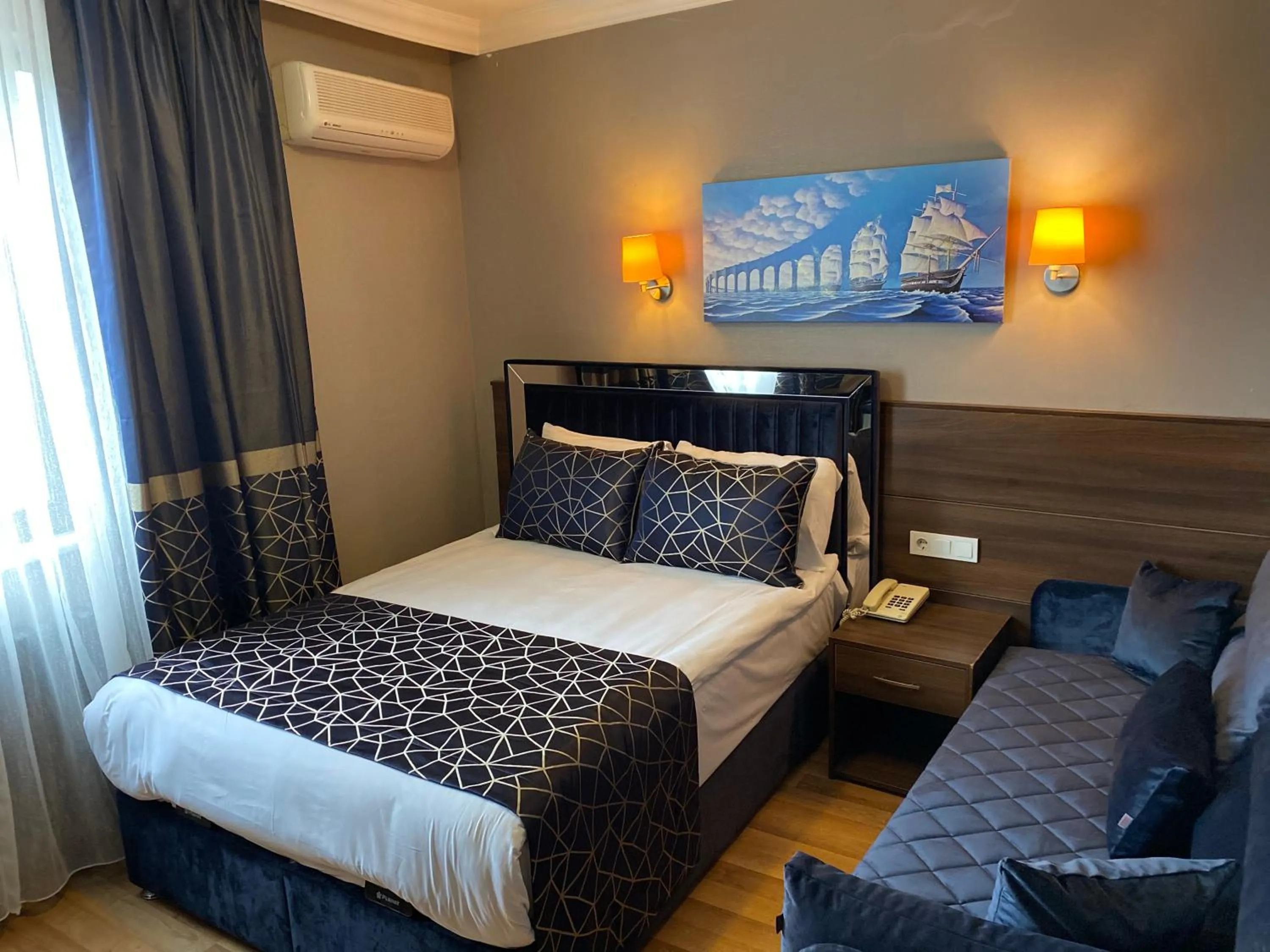 Bed in Star City Hotel