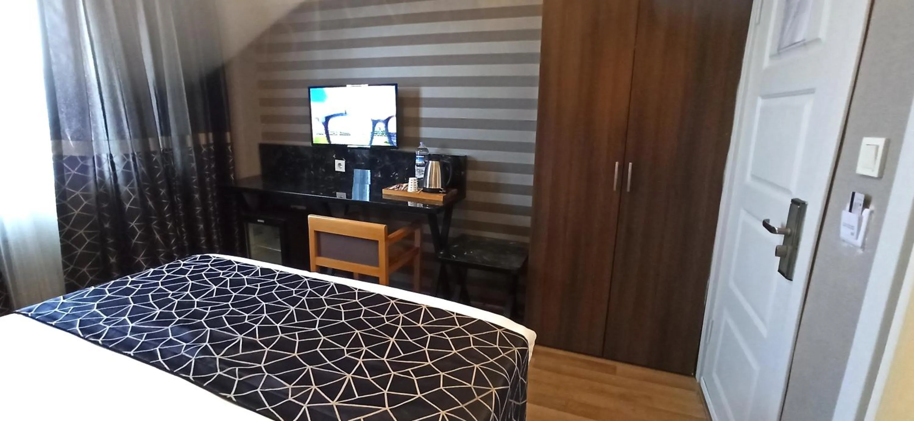 Bed in Star City Hotel