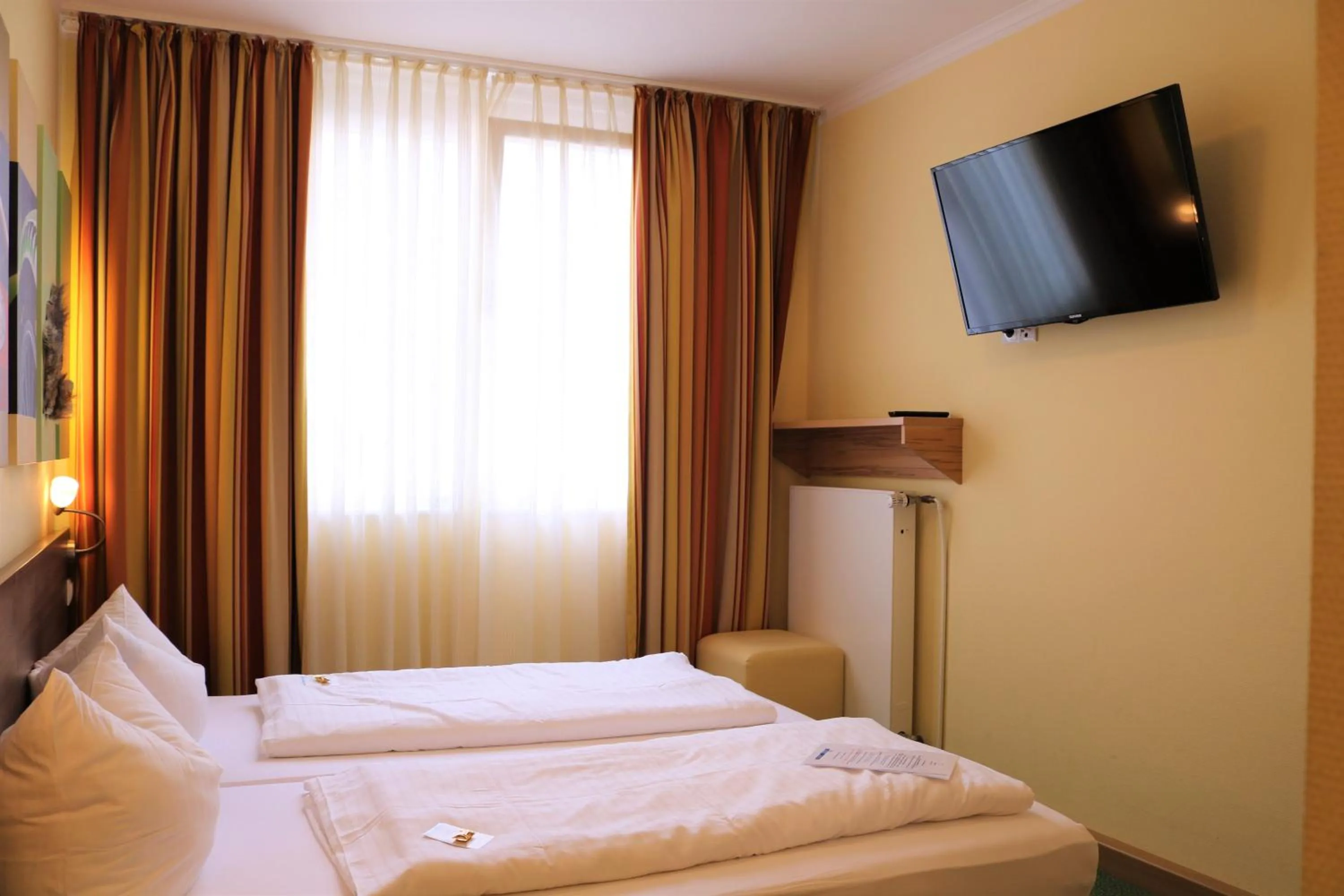 Bed in Gästehaus Blaue Ecke