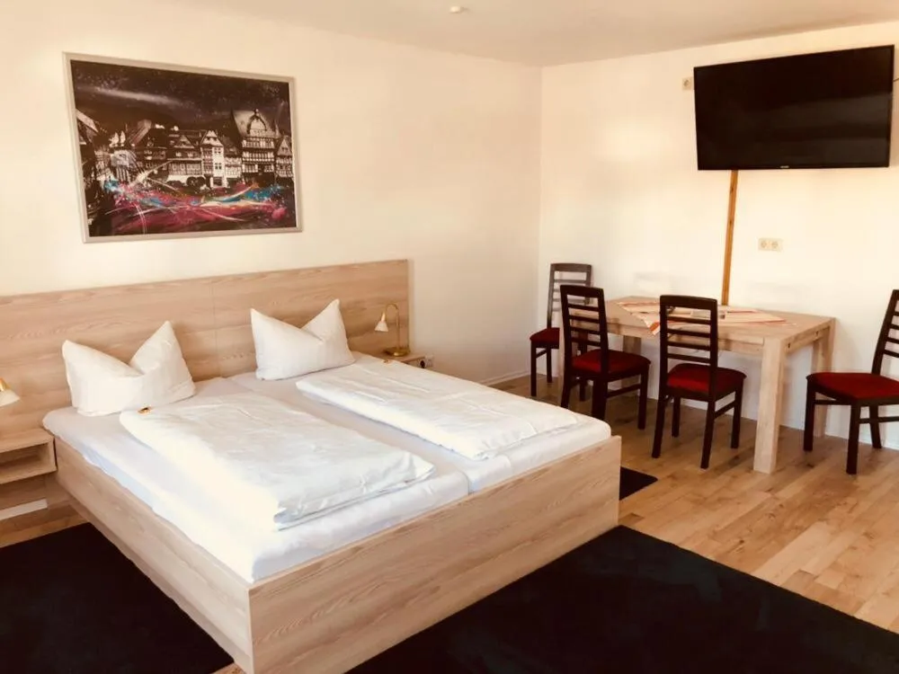 Photo of the whole room, Bed in Gästehaus Blaue Ecke