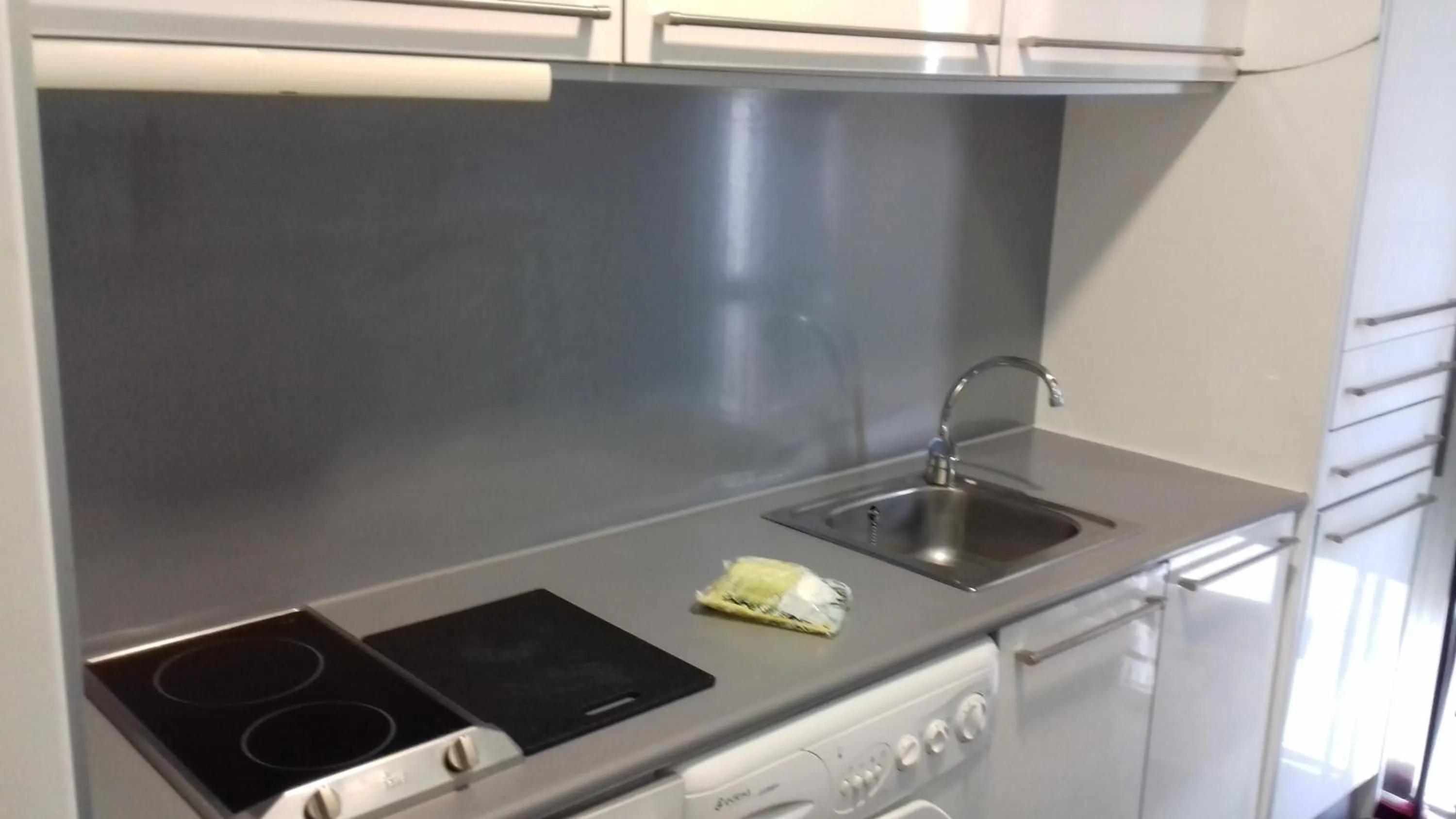 Kitchen or kitchenette in Apartamentos Turísticos Los Ángeles