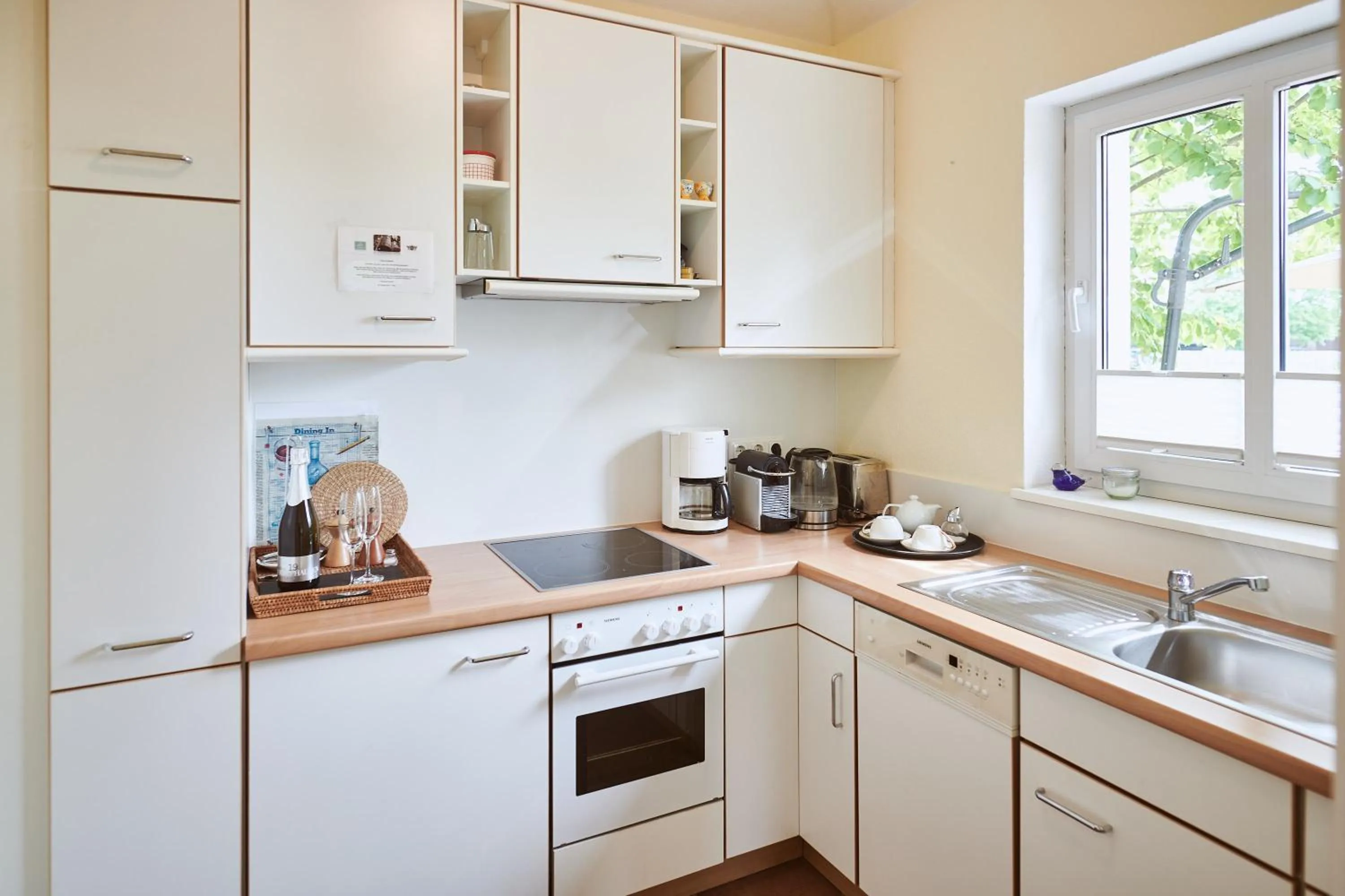 Kitchen or kitchenette in Gutshotel Baron Knyphausen