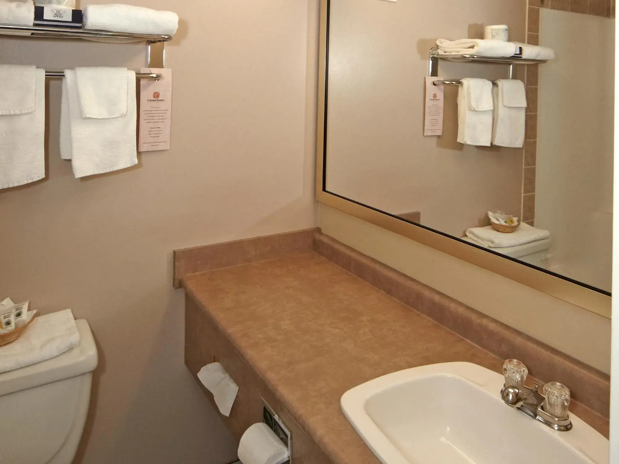 Bathroom in Colonial Square Inn & Suites Bathroom in Colonial Square Inn & Suites