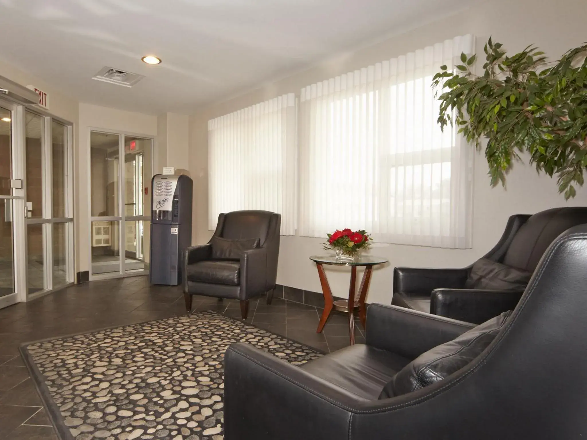 Lobby or reception in Colonial Square Inn & Suites Lobby or reception in Colonial Square Inn & Suites