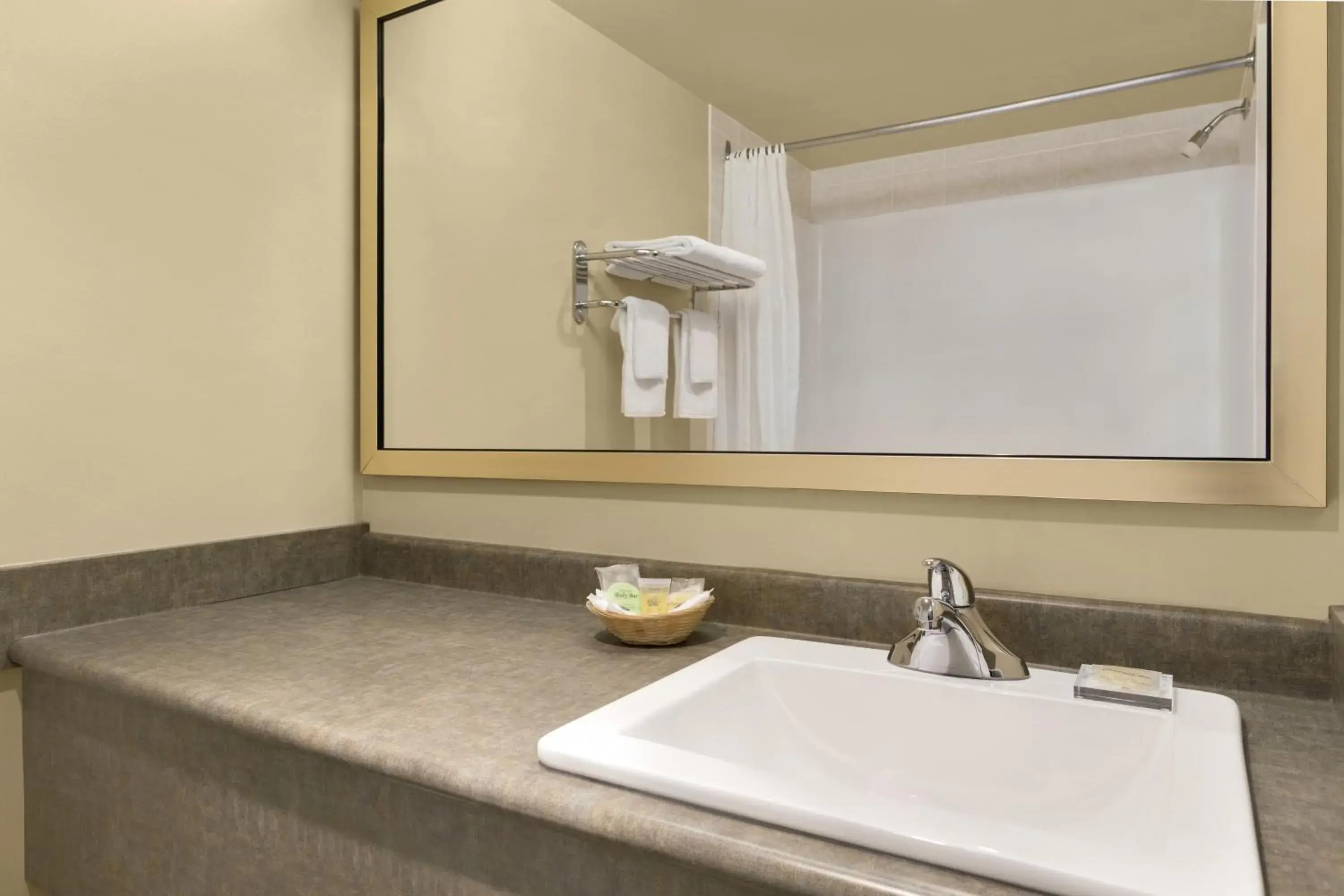 Bathroom in Colonial Square Inn & Suites Bathroom in Colonial Square Inn & Suites