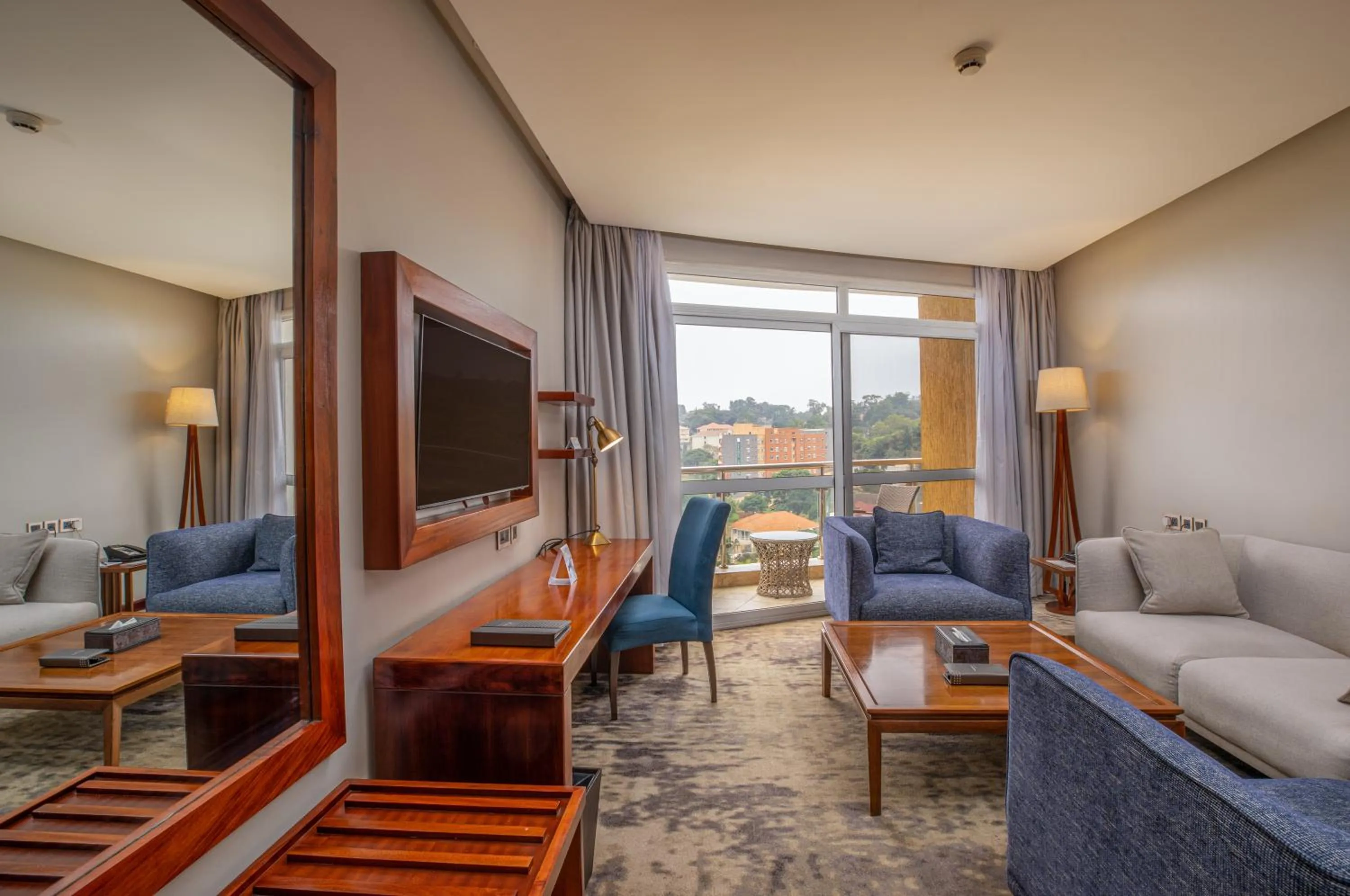 Communal lounge/ TV room in Golden Tulip Canaan Kampala