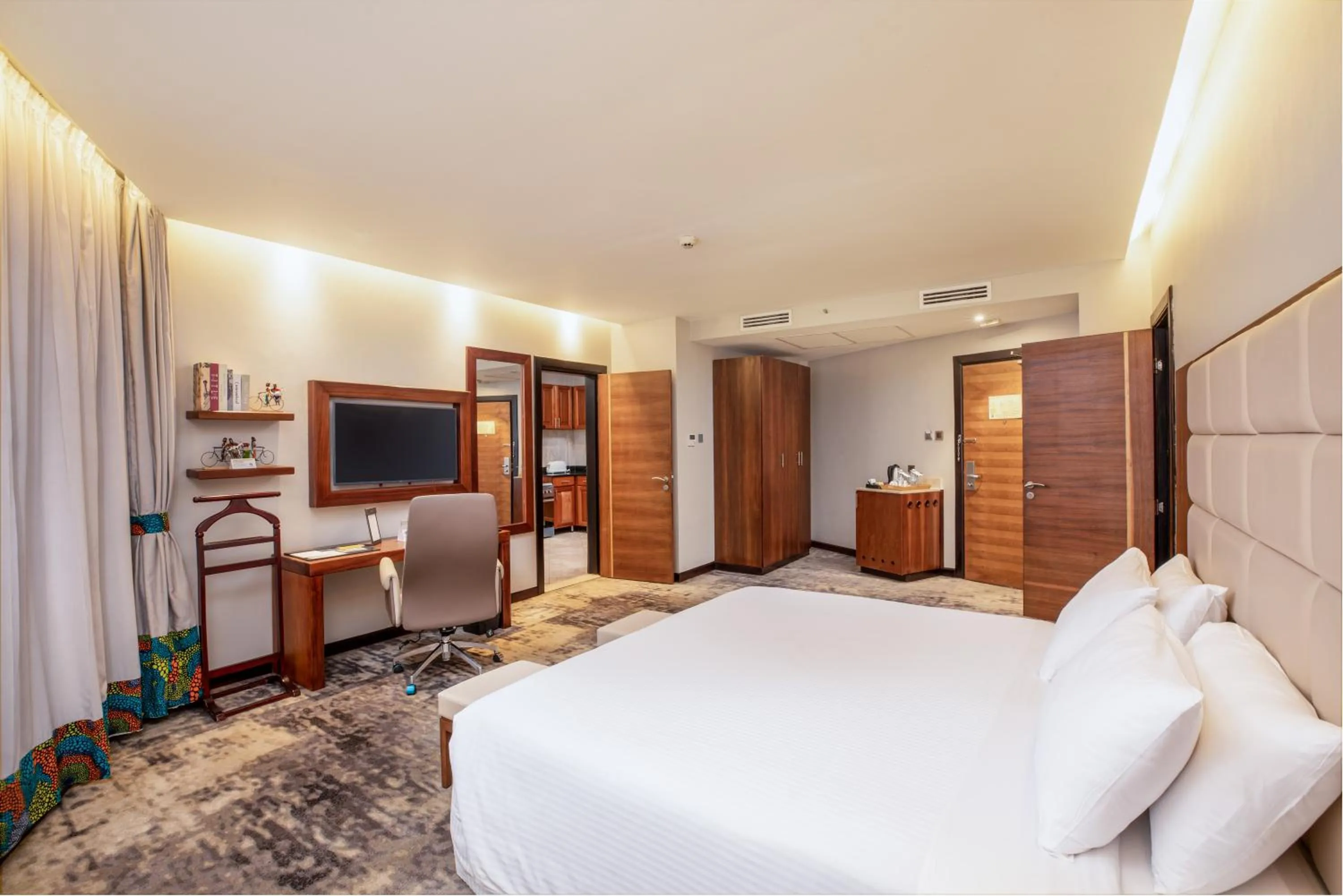 Bed in Golden Tulip Canaan Kampala