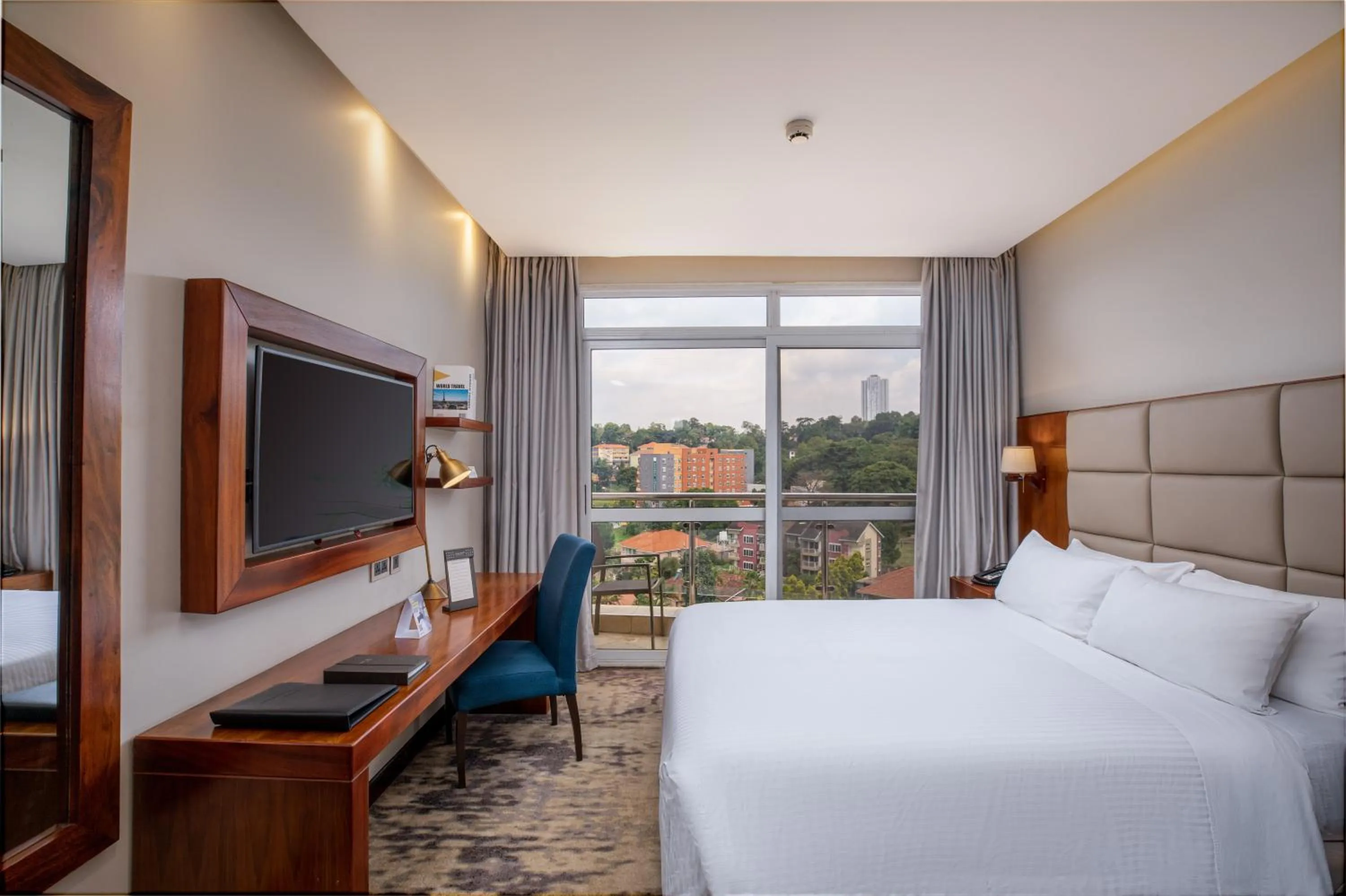 Bed in Golden Tulip Canaan Kampala