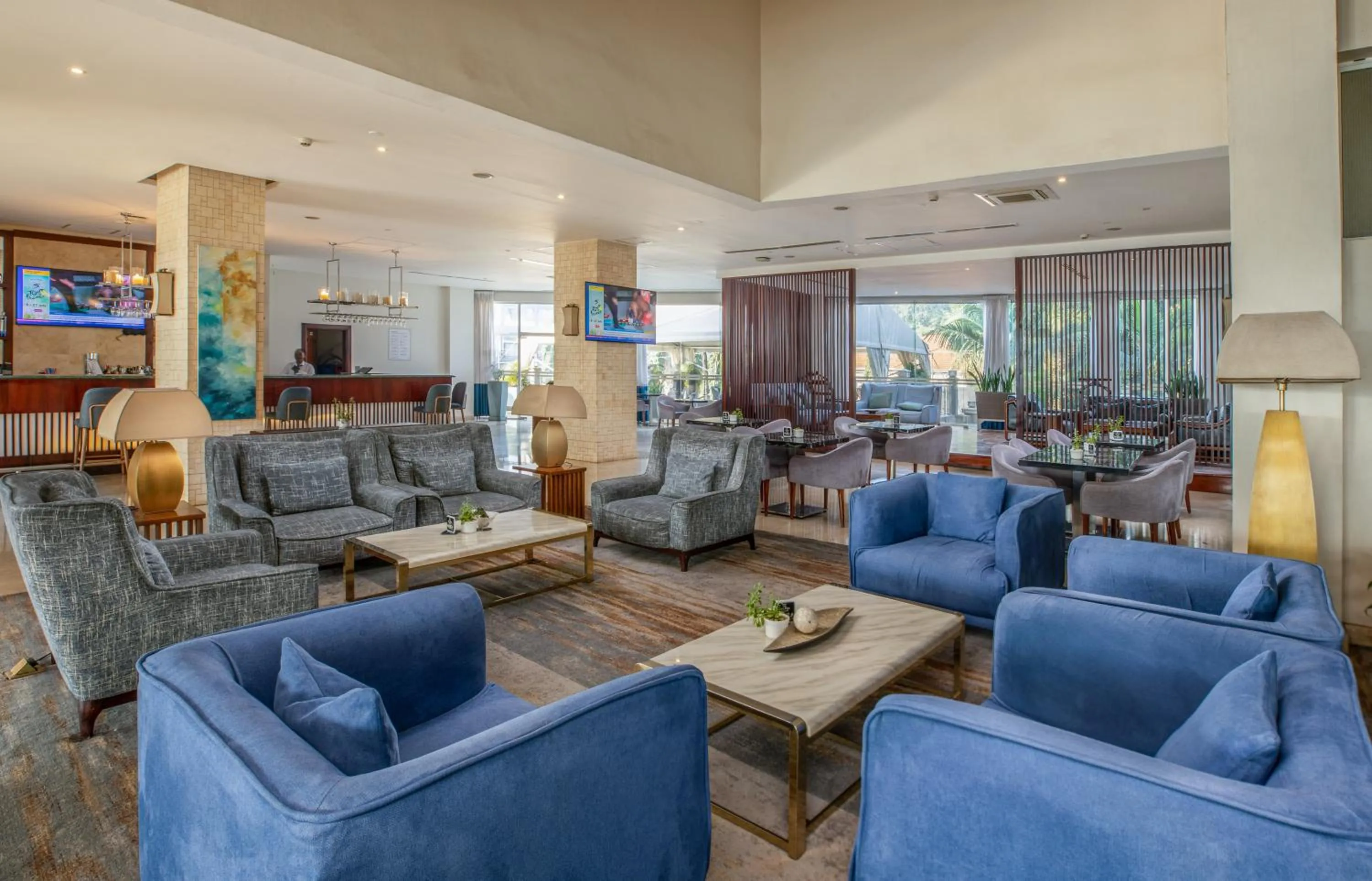 Communal lounge/ TV room in Golden Tulip Canaan Kampala