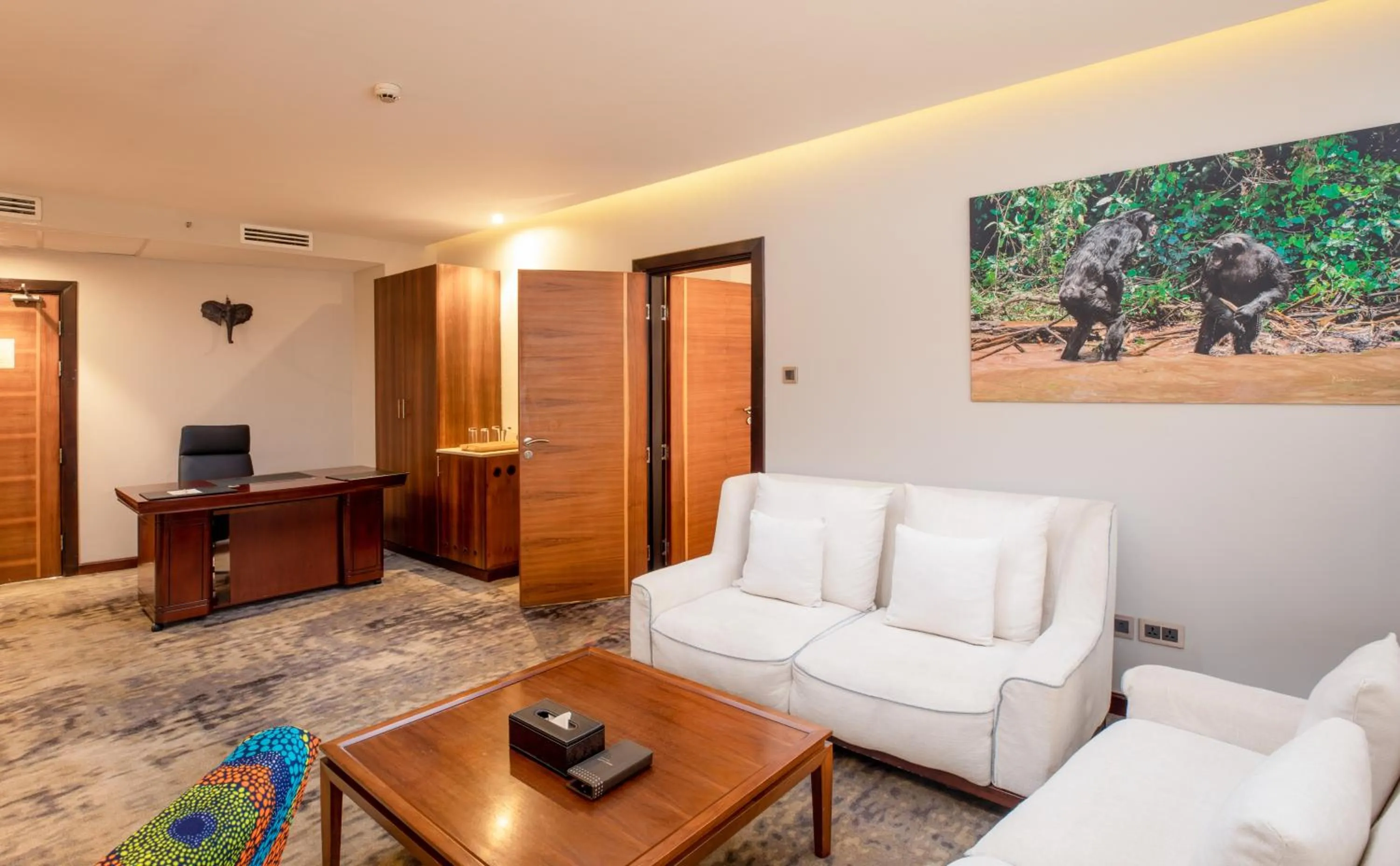 Communal lounge/ TV room in Golden Tulip Canaan Kampala