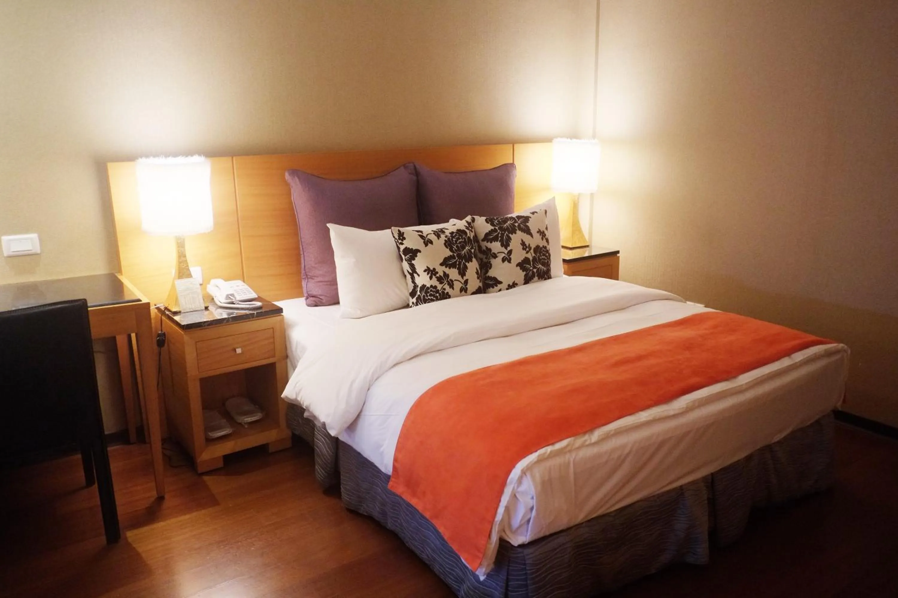 Bed in Aqua Bella Hotel