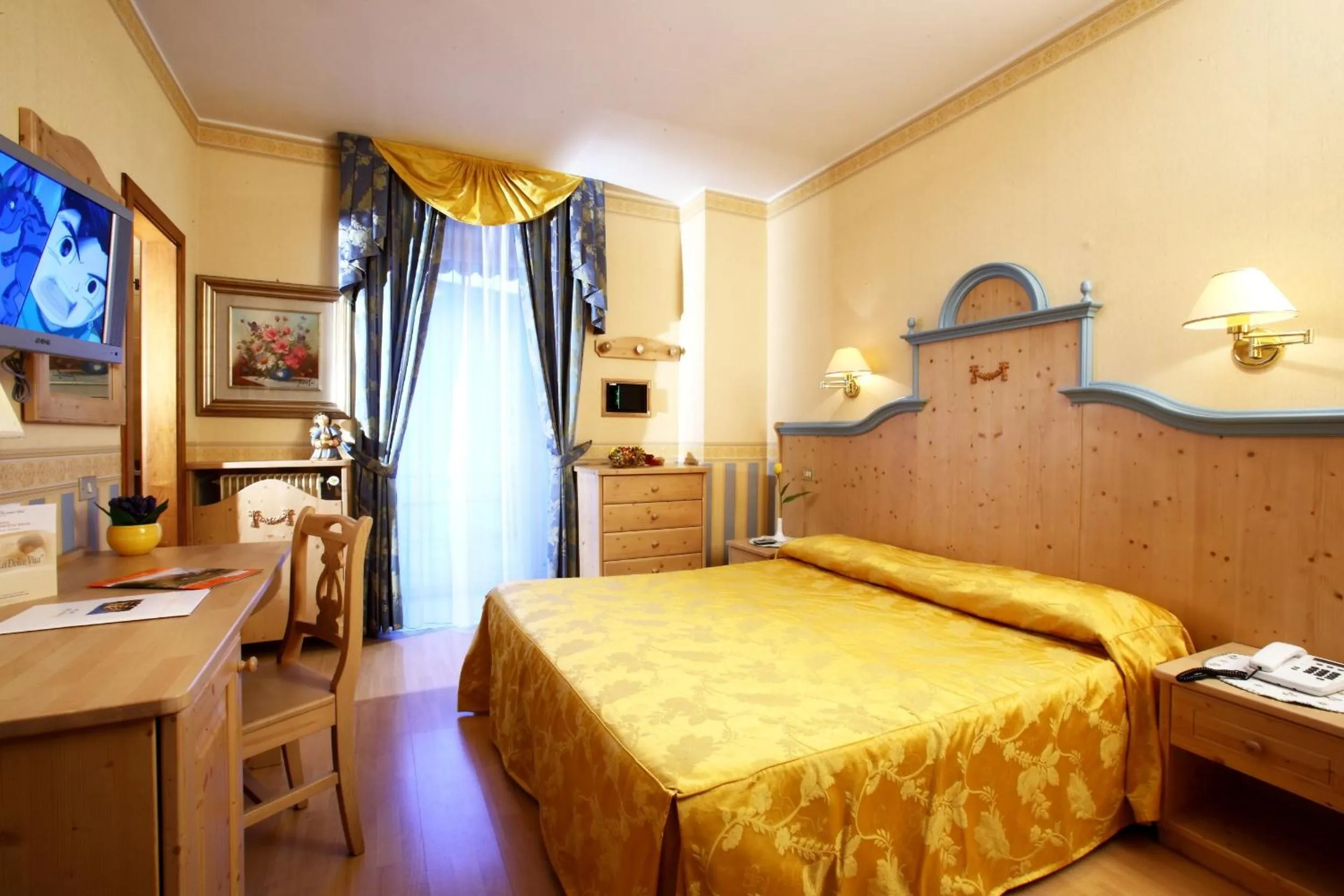 Bed in Alexander Hotel Alpine Wellness Dolomites