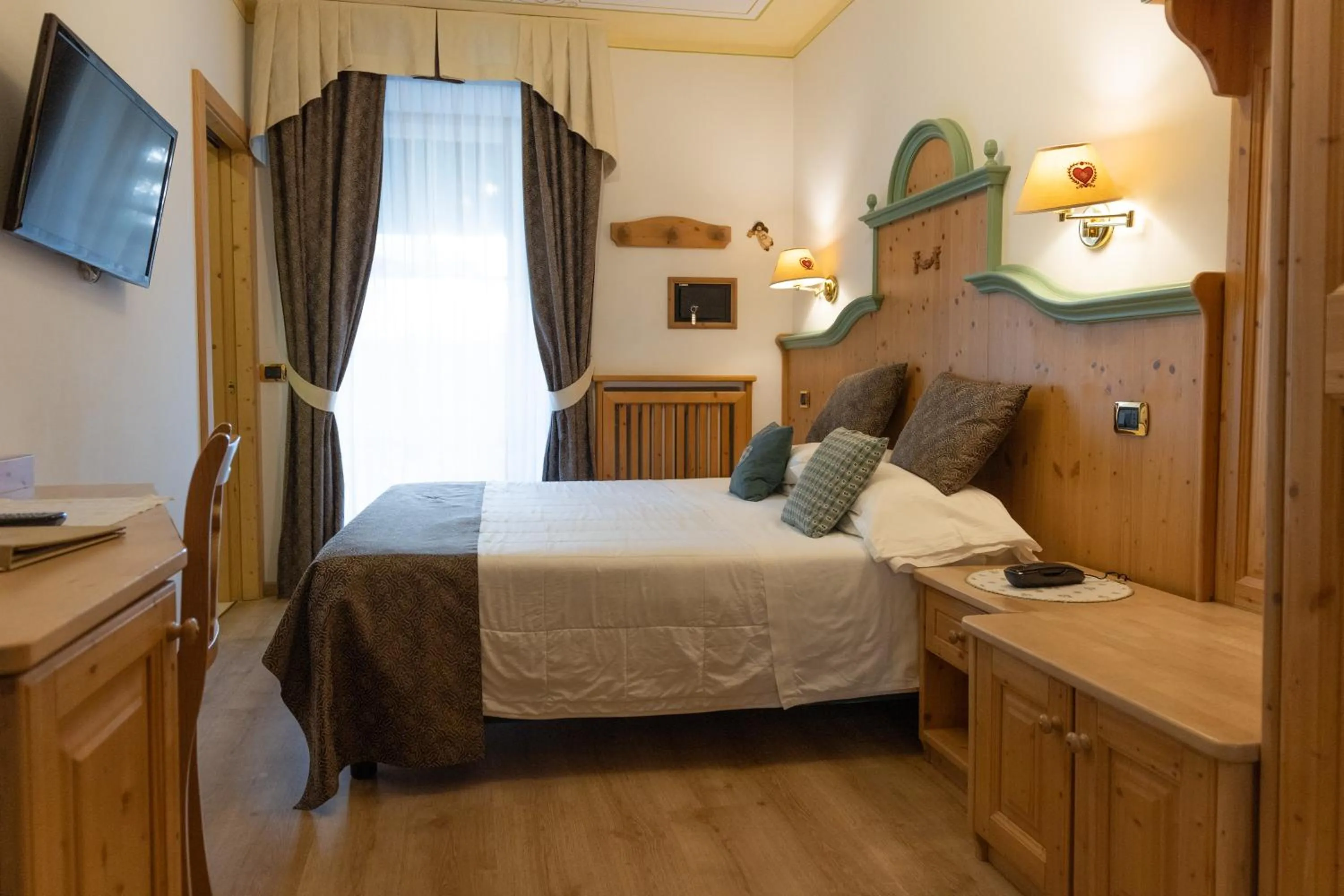 Bed in Alexander Hotel Alpine Wellness Dolomites