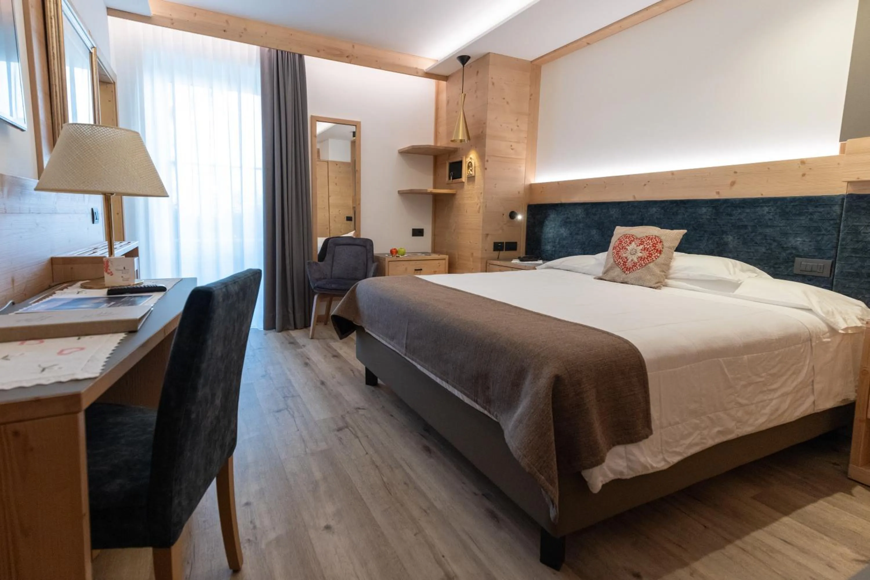 Bed in Alexander Hotel Alpine Wellness Dolomites