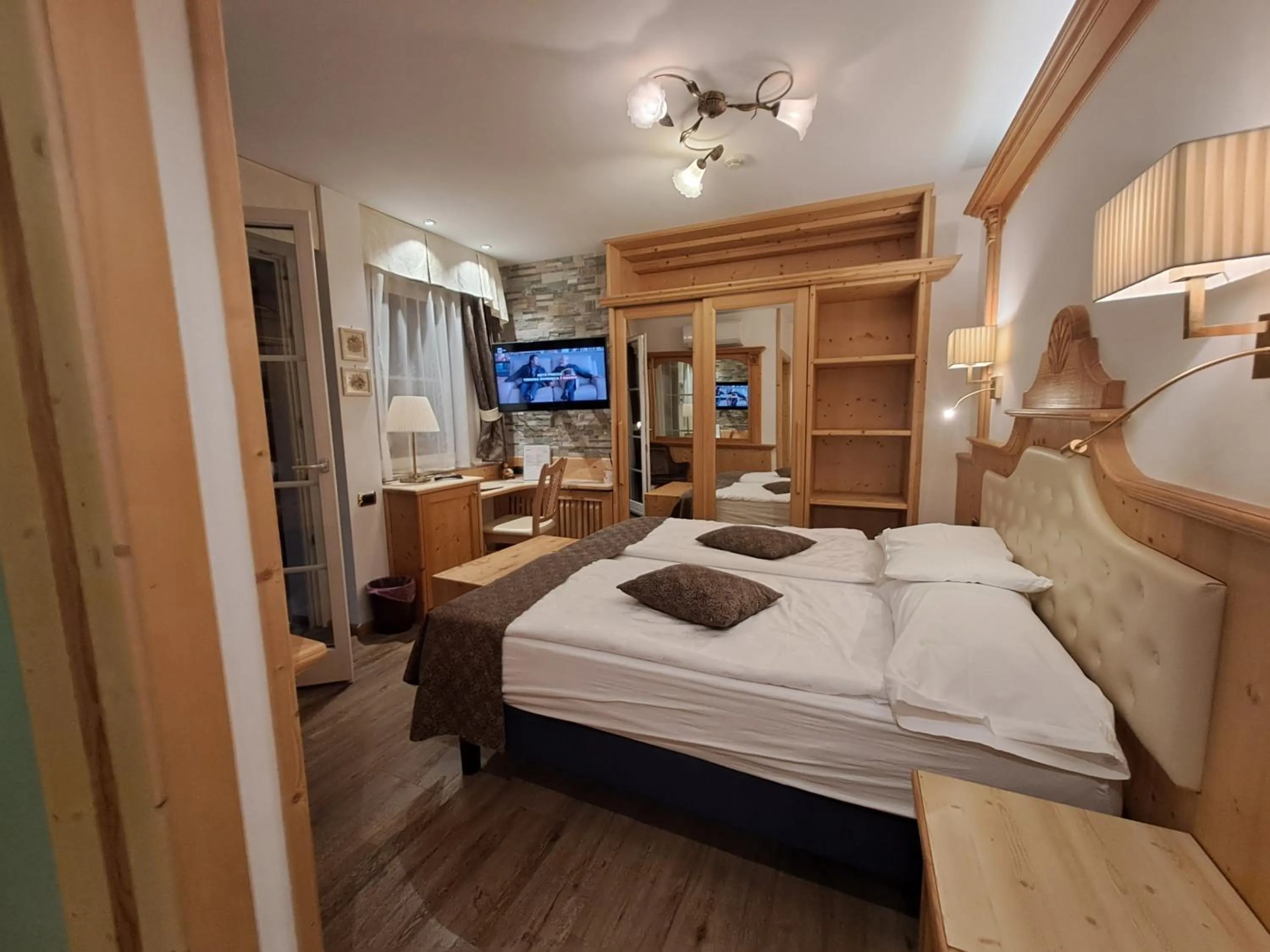 Bed in Alexander Hotel Alpine Wellness Dolomites