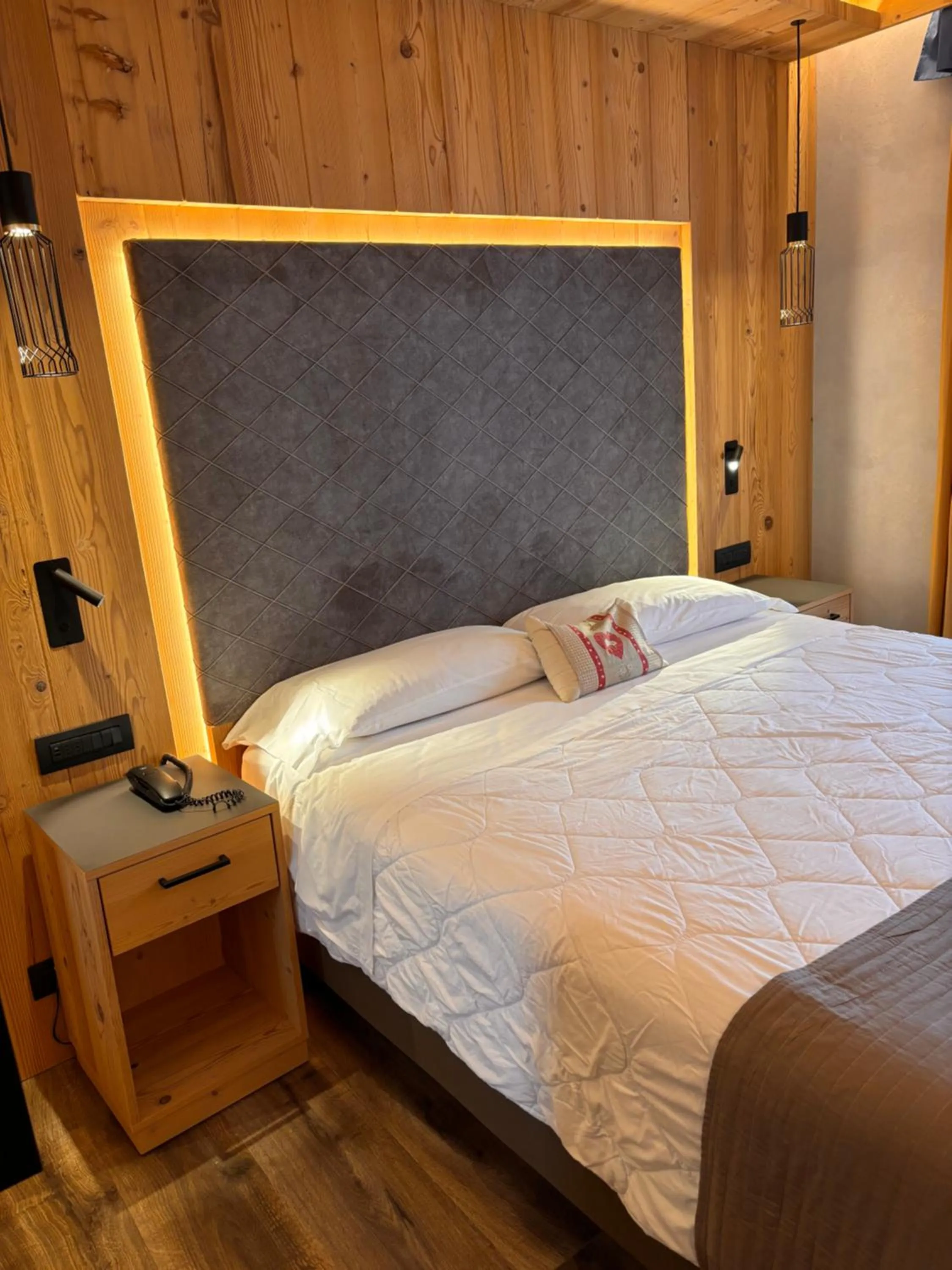 Bed in Alexander Hotel Alpine Wellness Dolomites