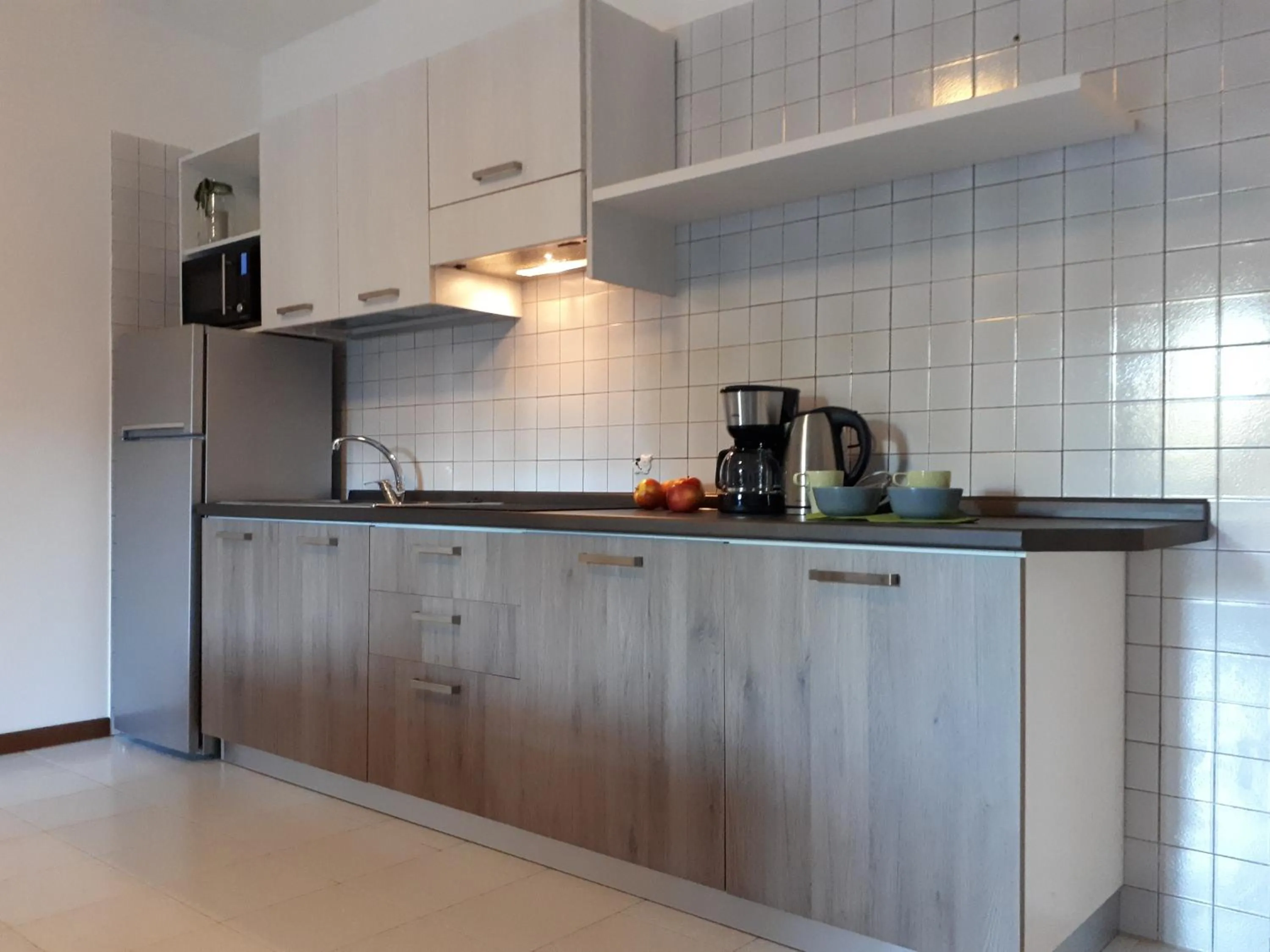 Kitchen or kitchenette in 3MÙZEN apartments