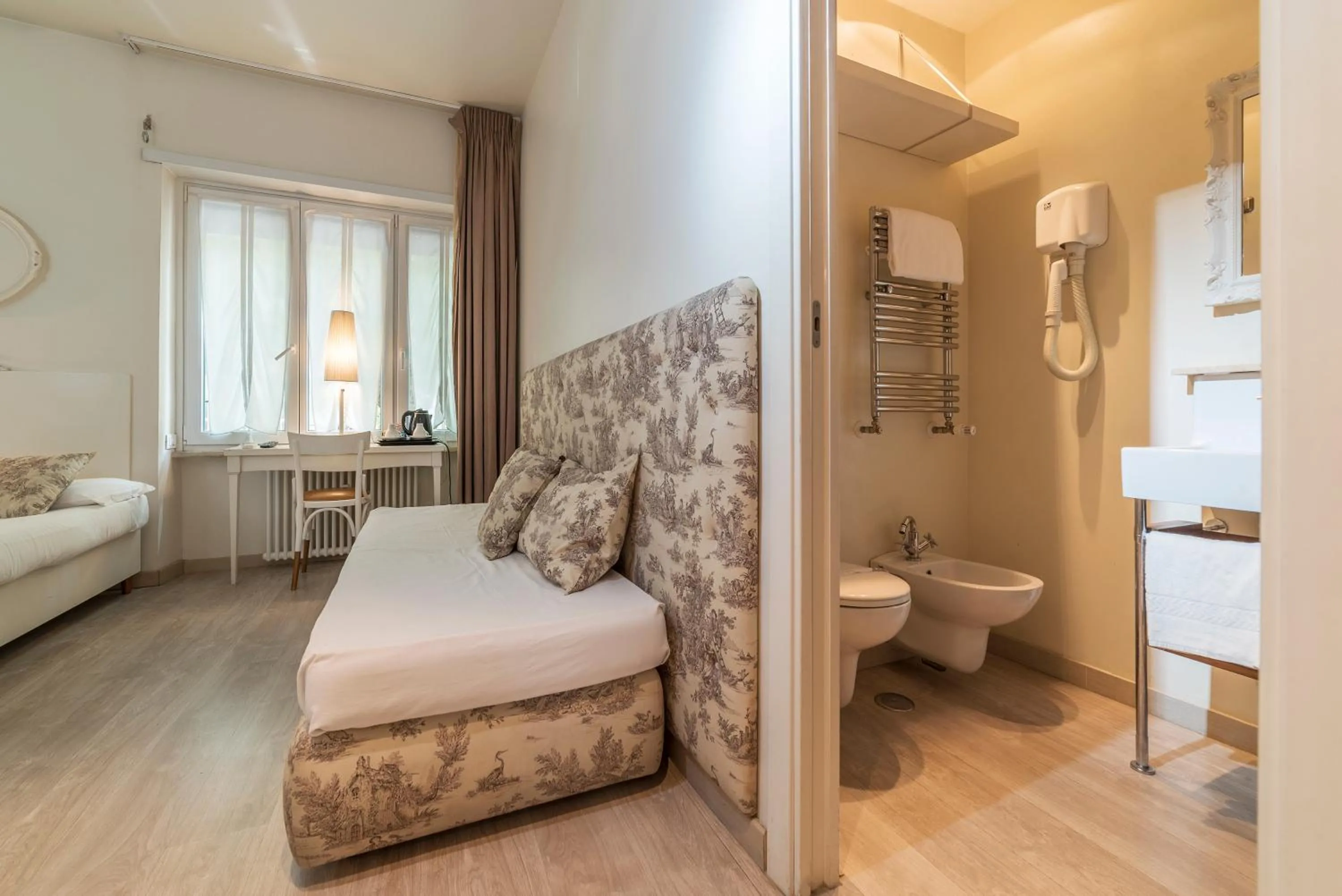 Photo of the whole room, Bed in Nina Casetta De Trastevere