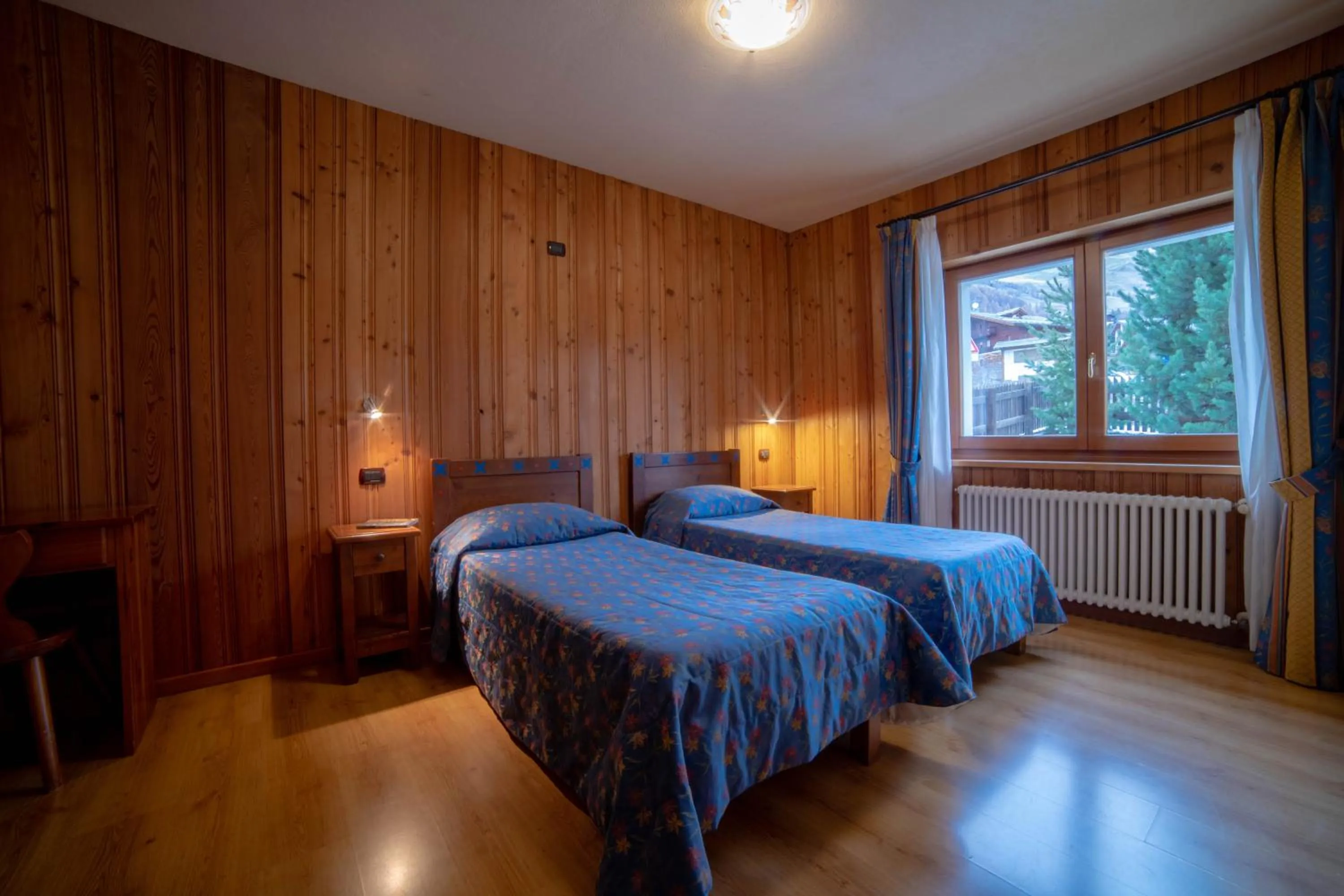 Bedroom, Bed in Family Apartments Le Chalet