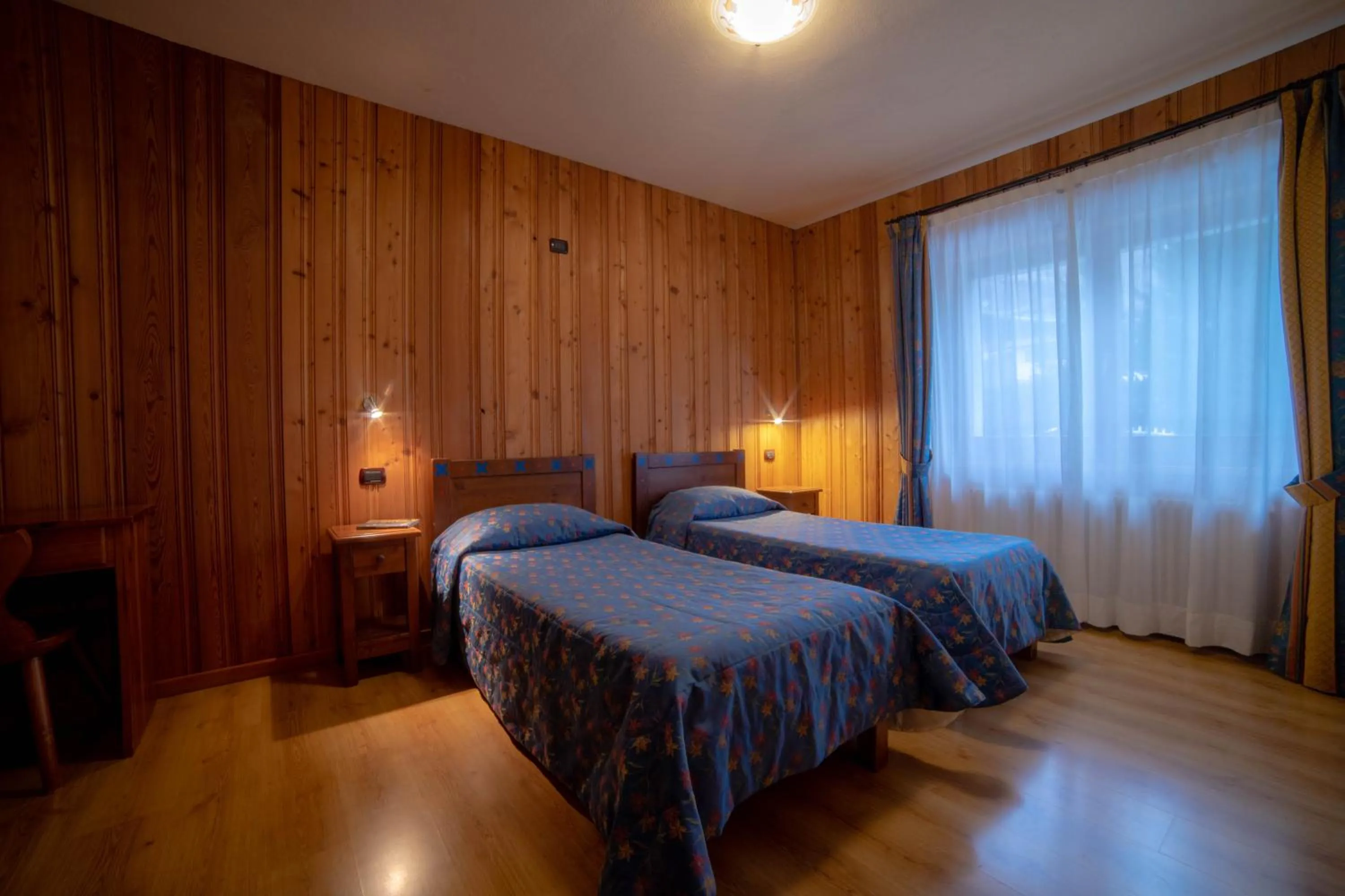 Bedroom, Bed in Family Apartments Le Chalet