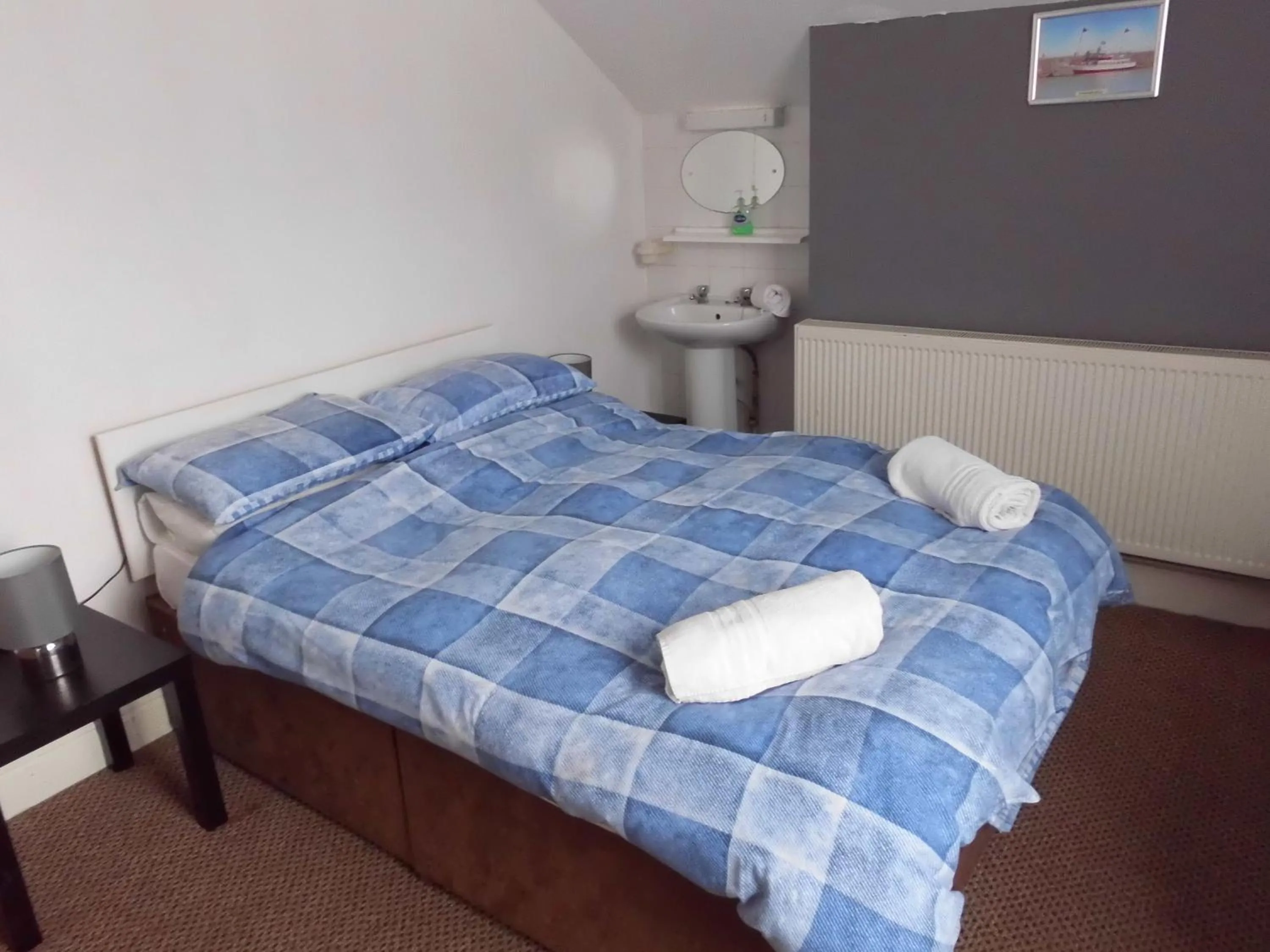 Bed in Jasmine Guest House
