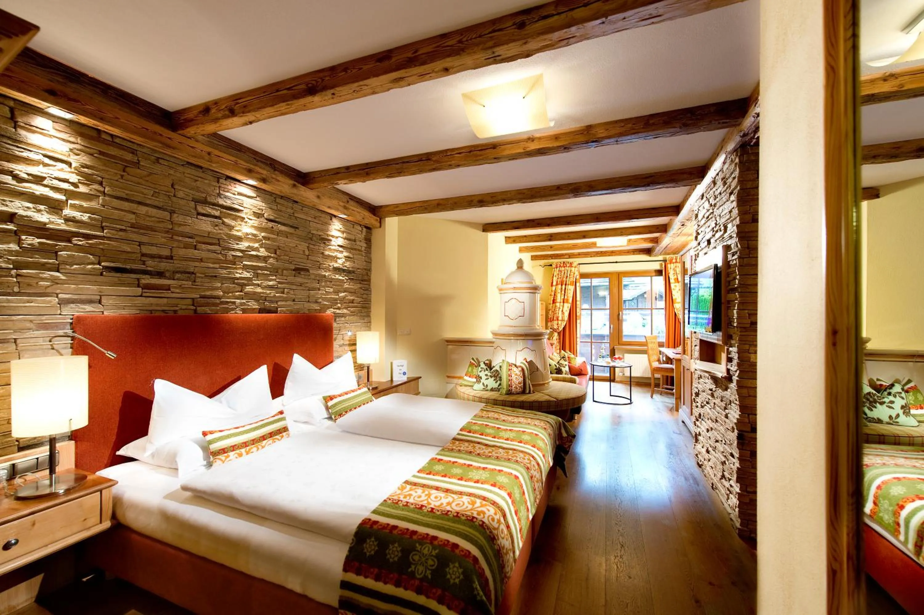Photo of the whole room, Bed in Hotel Alpin Spa Tuxerhof