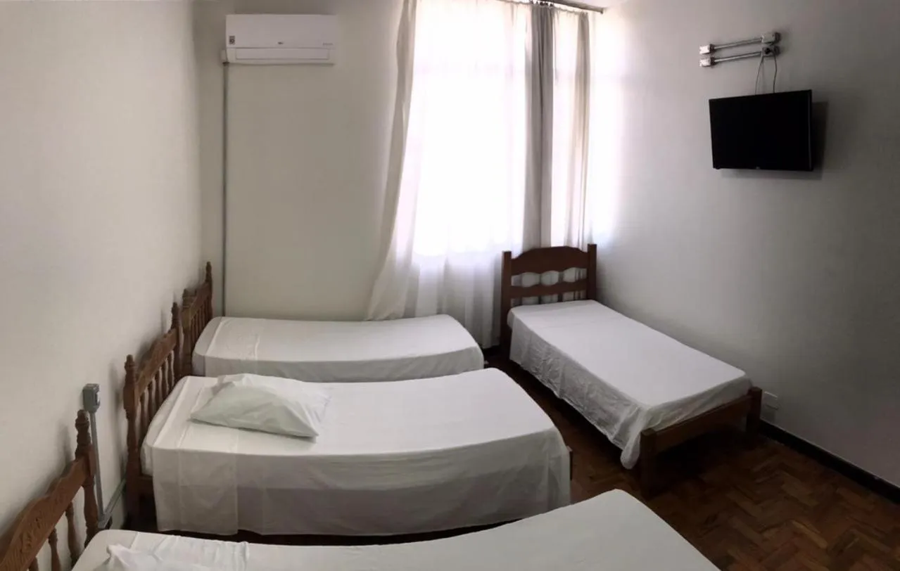 Bed in Hotel Sao Nicolau