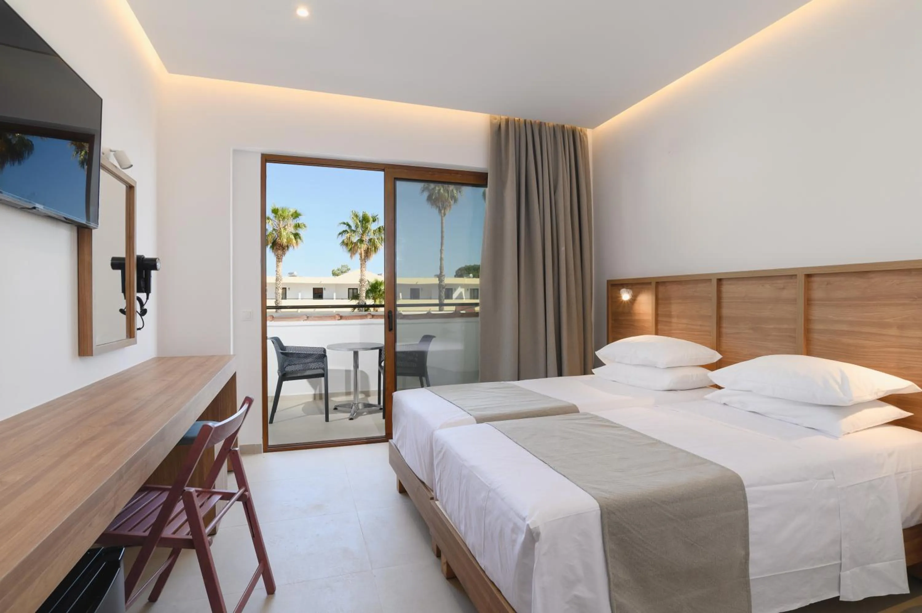 Bed in Pefkos Village Resort