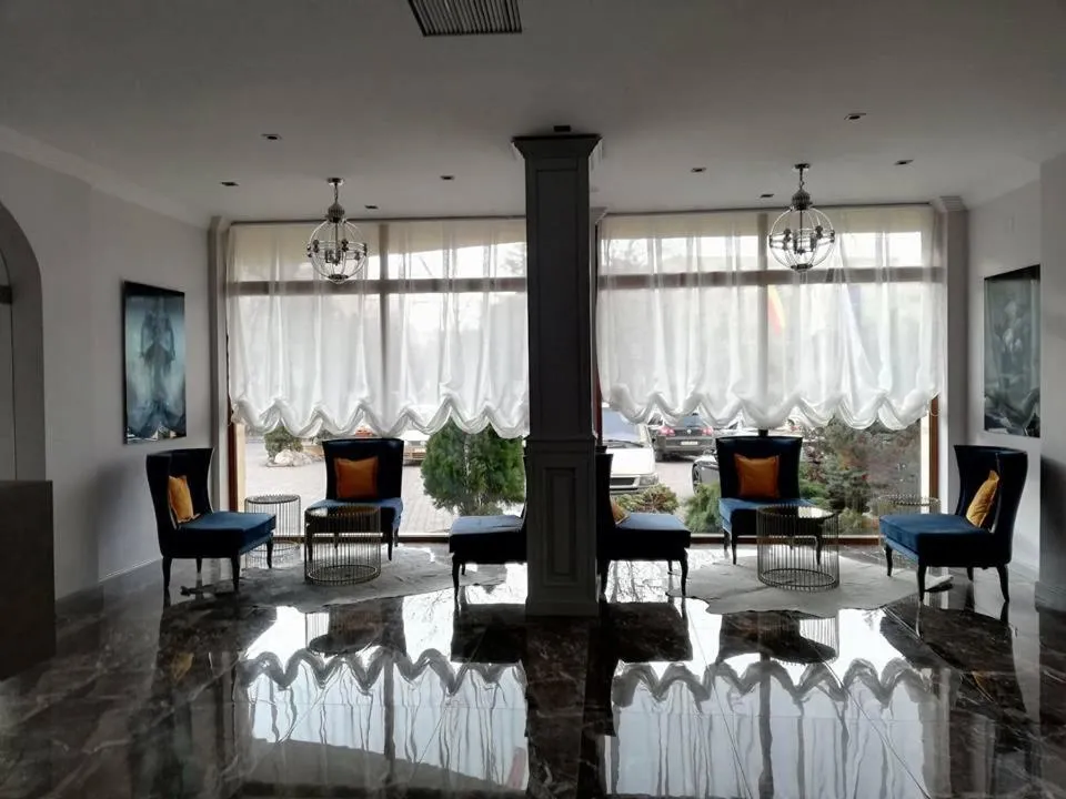 Communal lounge/ TV room in Royal Class Hotel