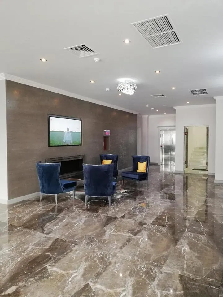 Communal lounge/ TV room in Royal Class Hotel