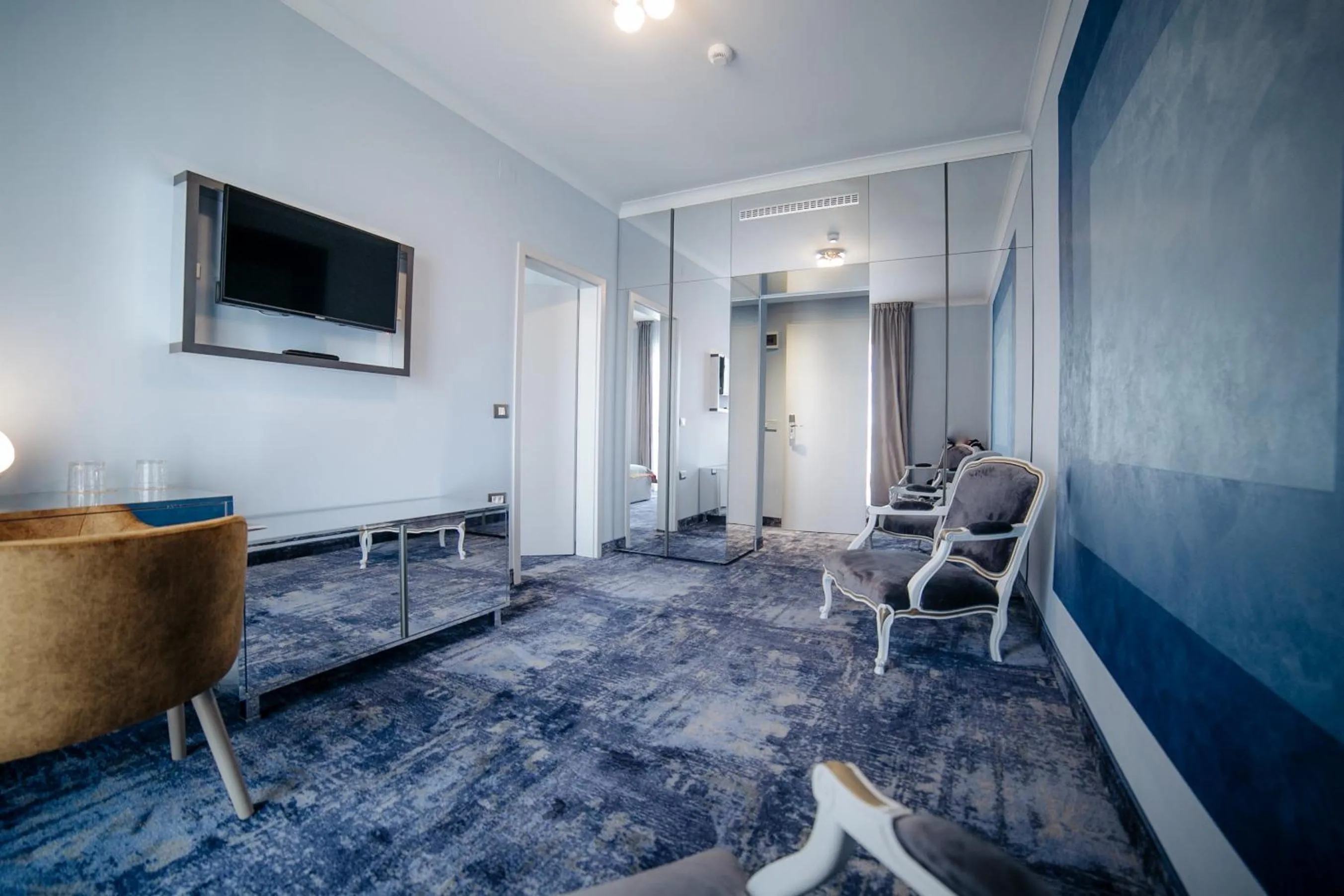 Communal lounge/ TV room in Royal Class Hotel