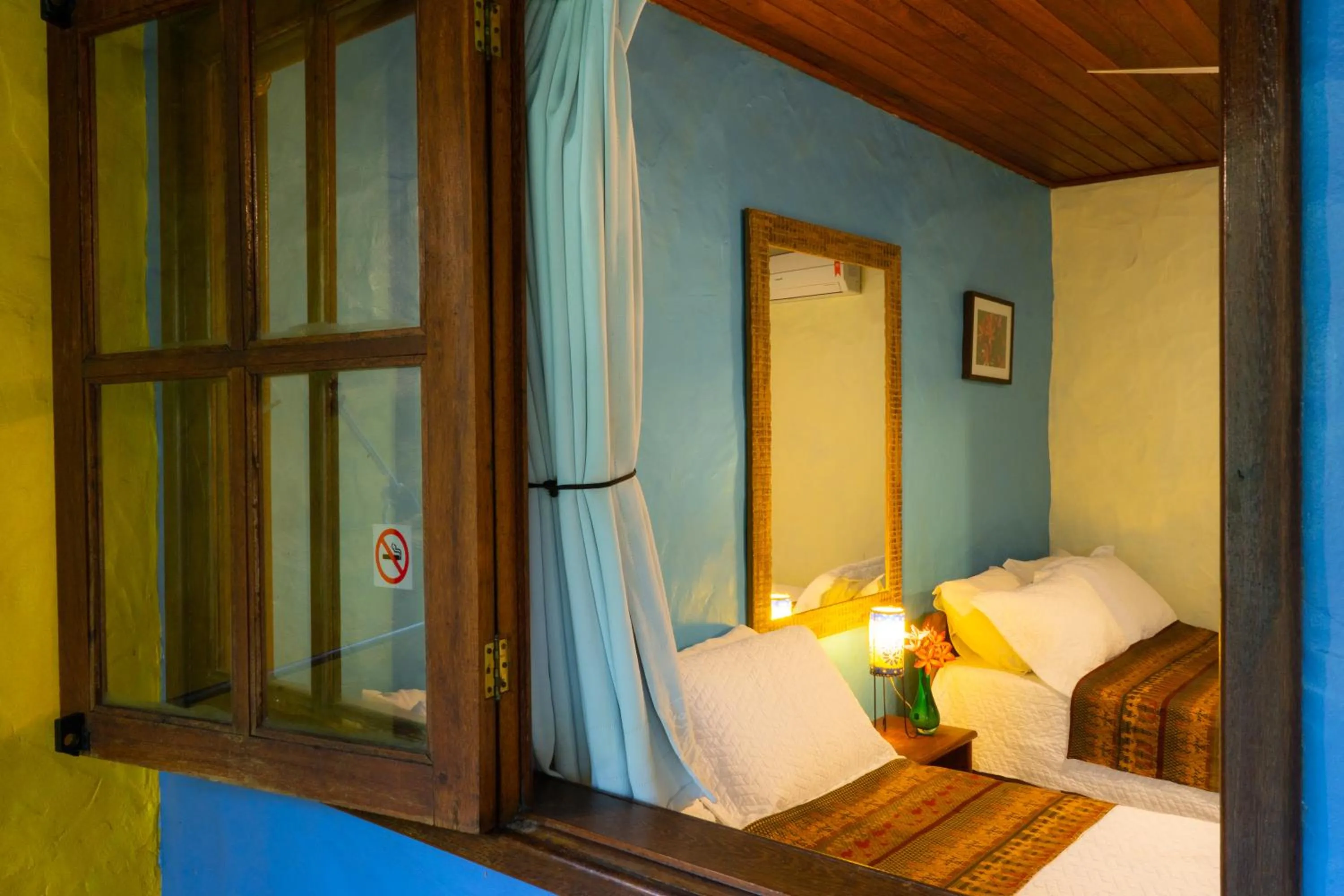 Bed in Atmosphera Pousada