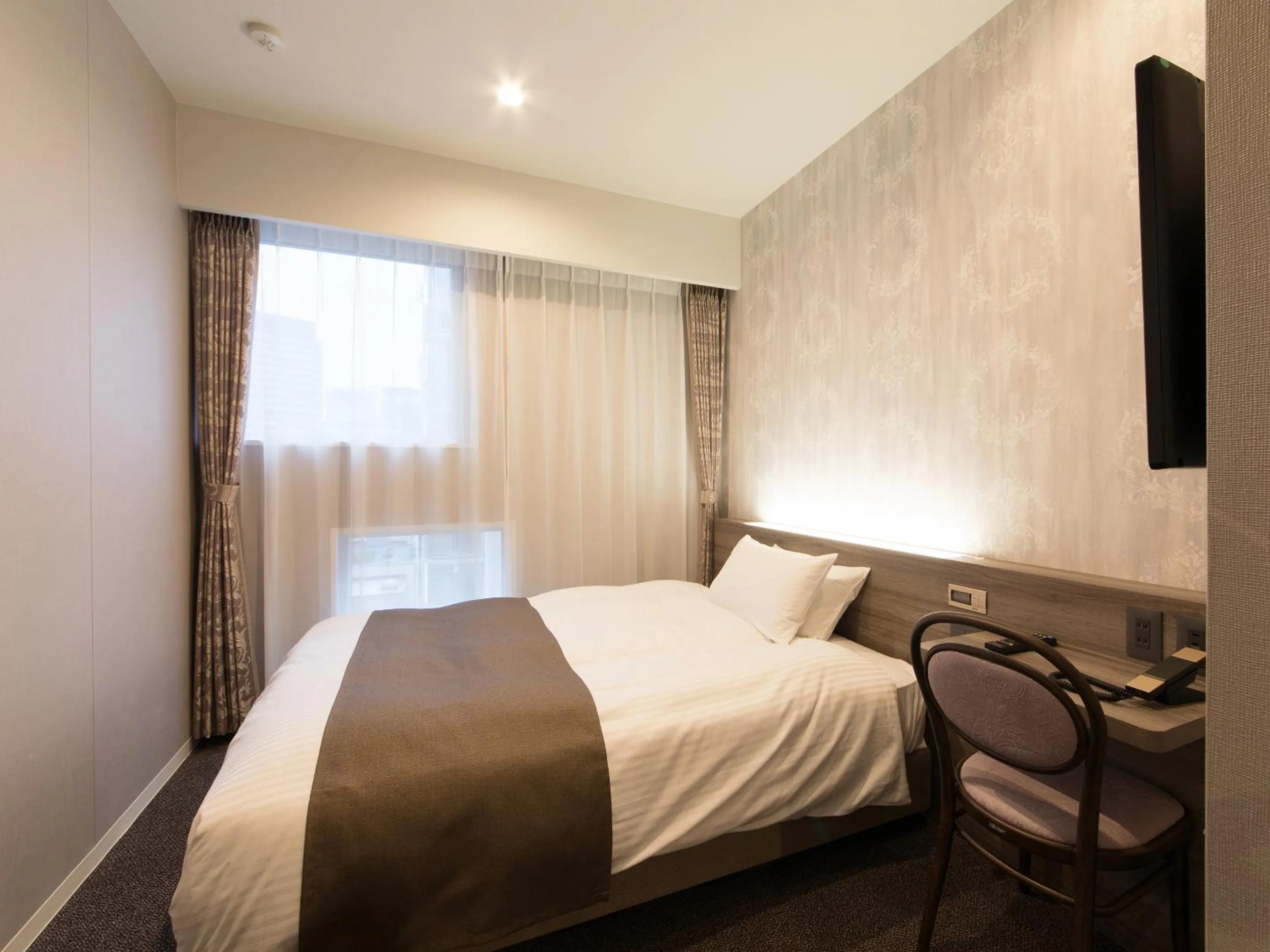 Photo of the whole room, Bed in S.Training Center Hotel Osaka