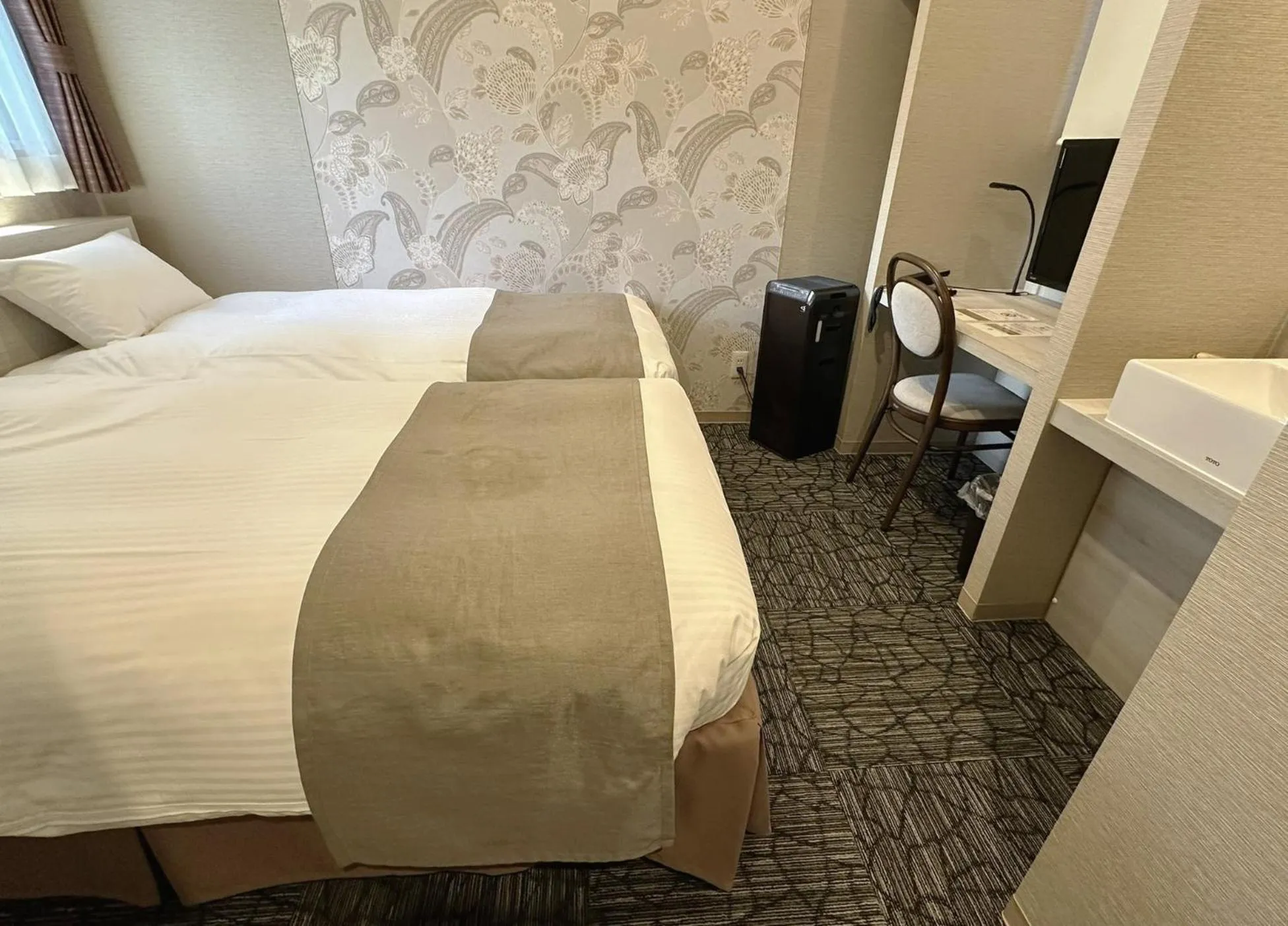 Bed in S.Training Center Hotel Osaka